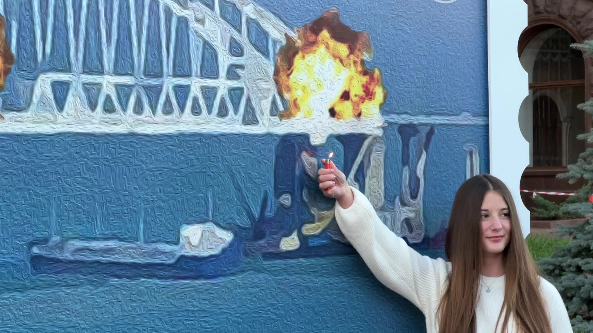 Artwork depicting Kerch bridge on fire in Kyiv, Ukraine