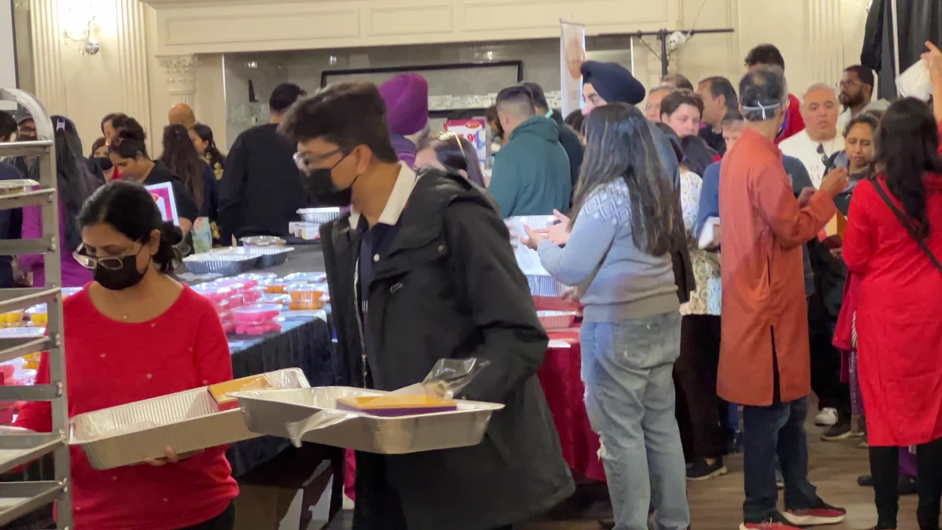 People purchase Indian sweets for the festival of Diwali 