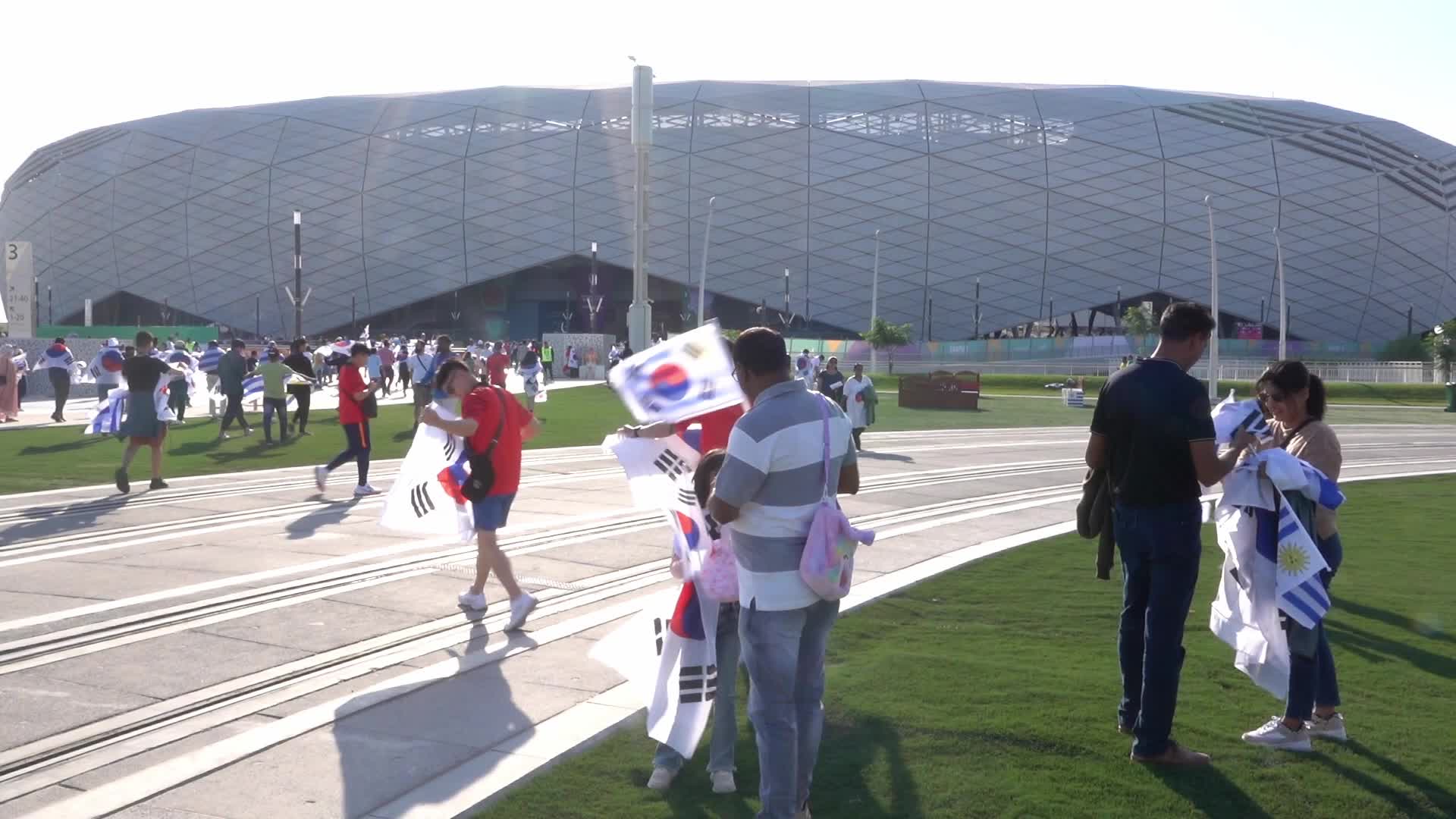 Fans arrive at Education City Stadium for the World Cup Match between Uruguay v Korea Republic