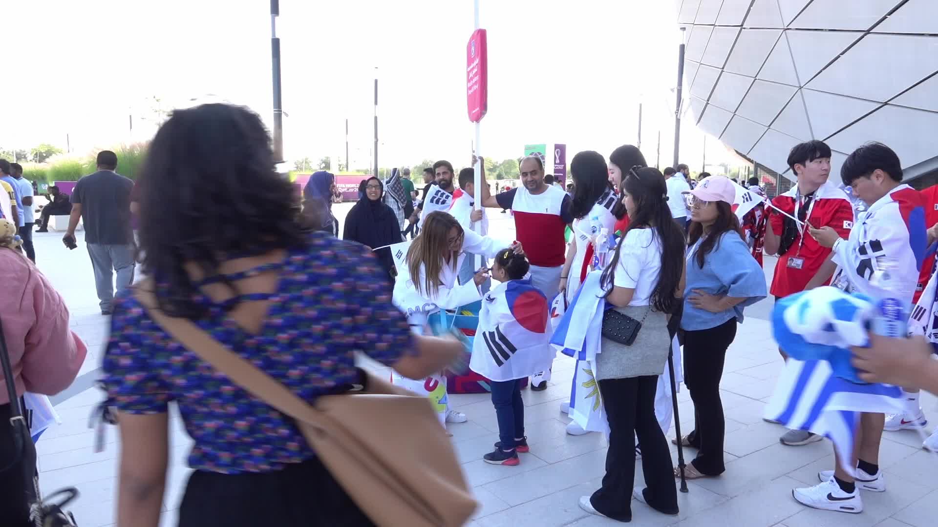 Fans arrive at Education City Stadium for the World Cup Match between Uruguay v Korea Republic