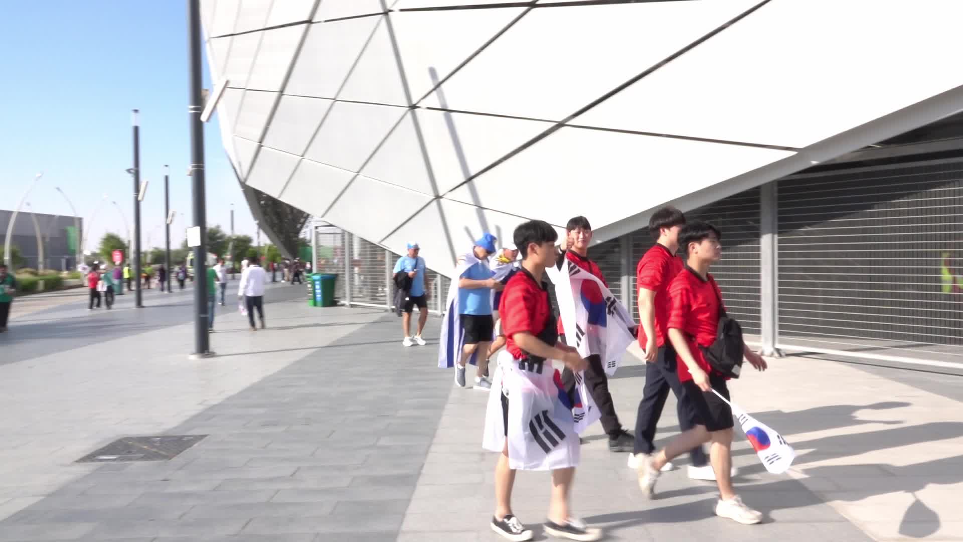 Fans arrive at Education City Stadium for the World Cup Match between Uruguay v Korea Republic