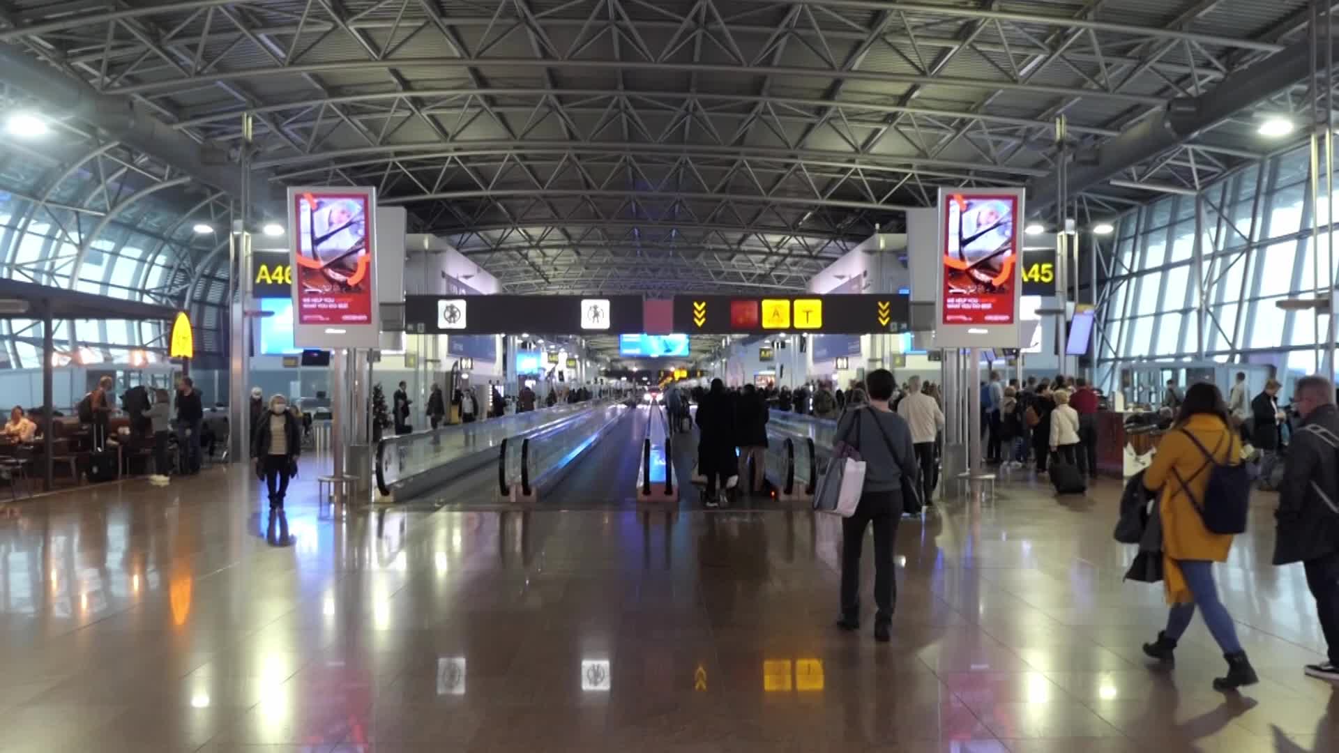Passengers inside the terminal, gates and baggage area of Brussels Zaventem Airport