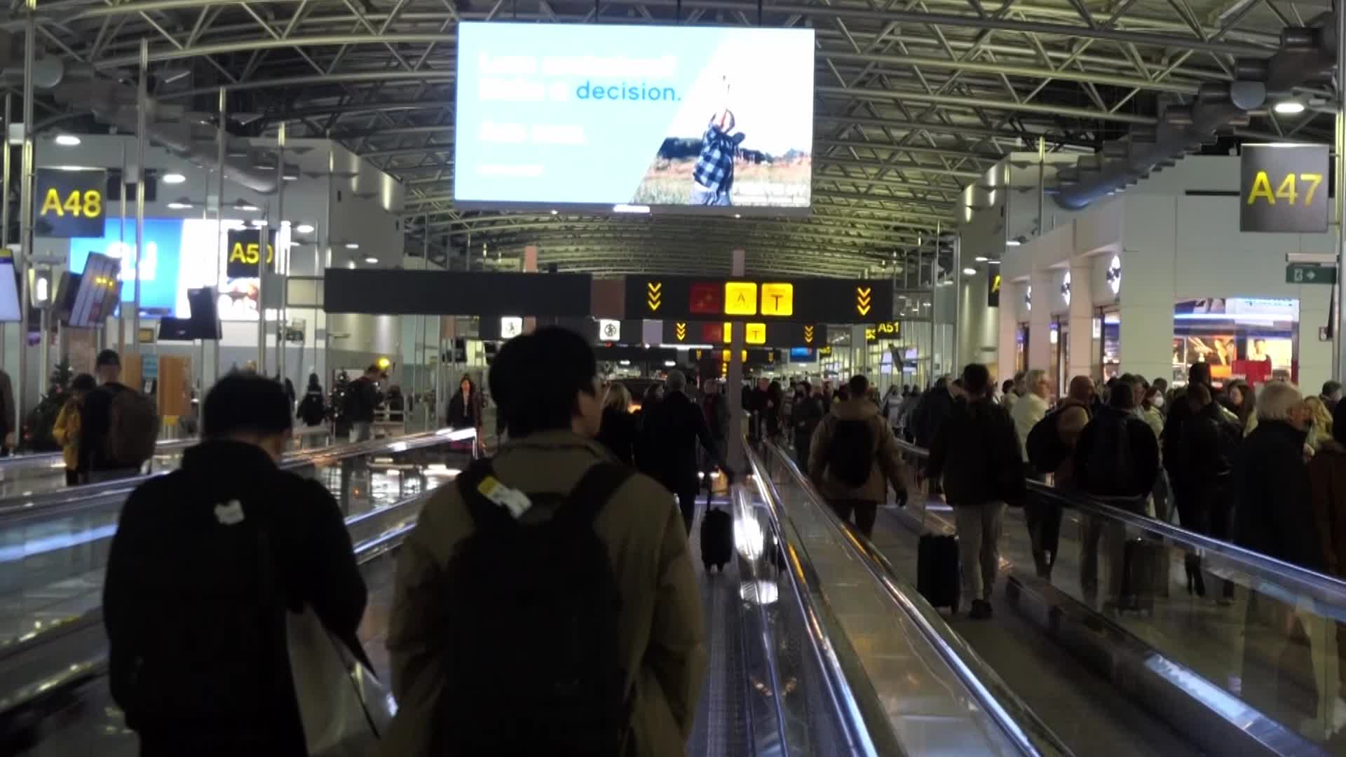 Passengers inside the terminal, gates and baggage area of Brussels Zaventem Airport