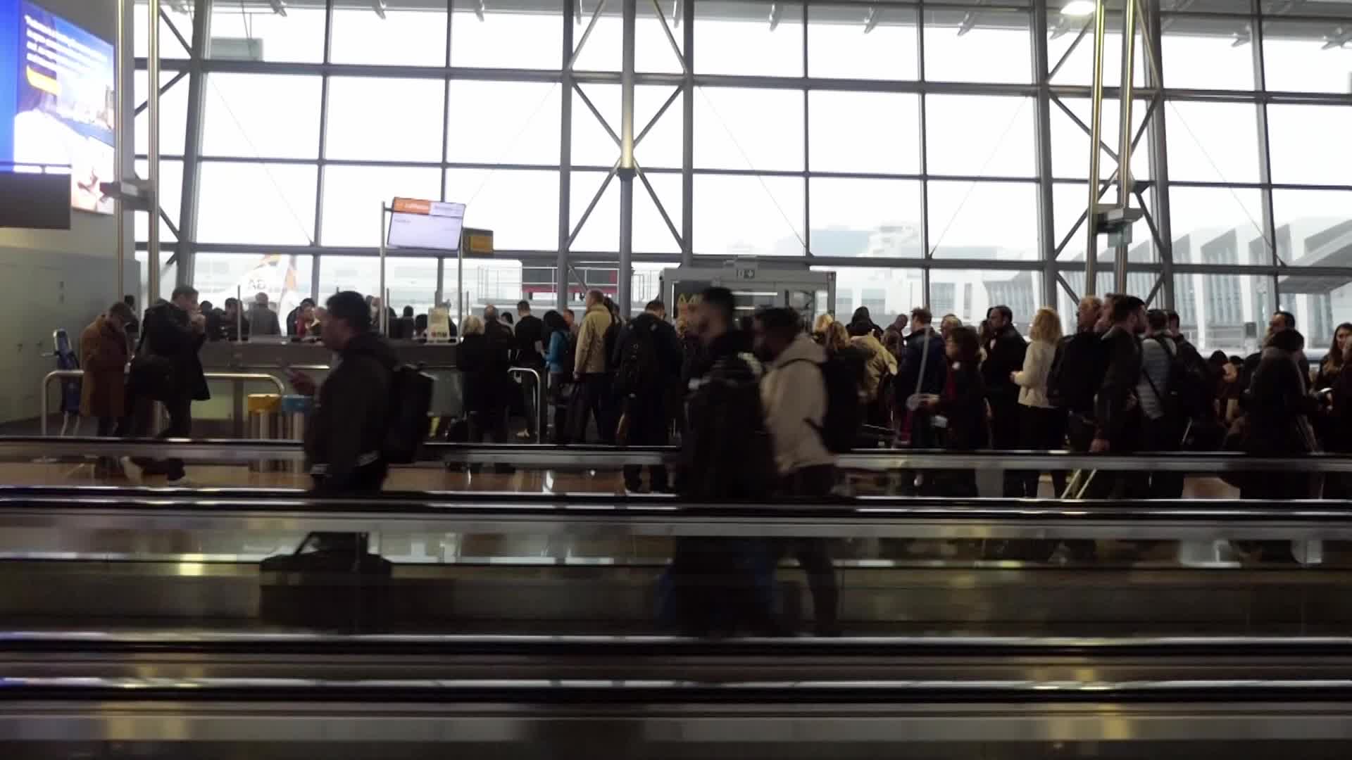 Passengers inside the terminal, gates and baggage area of Brussels Zaventem Airport