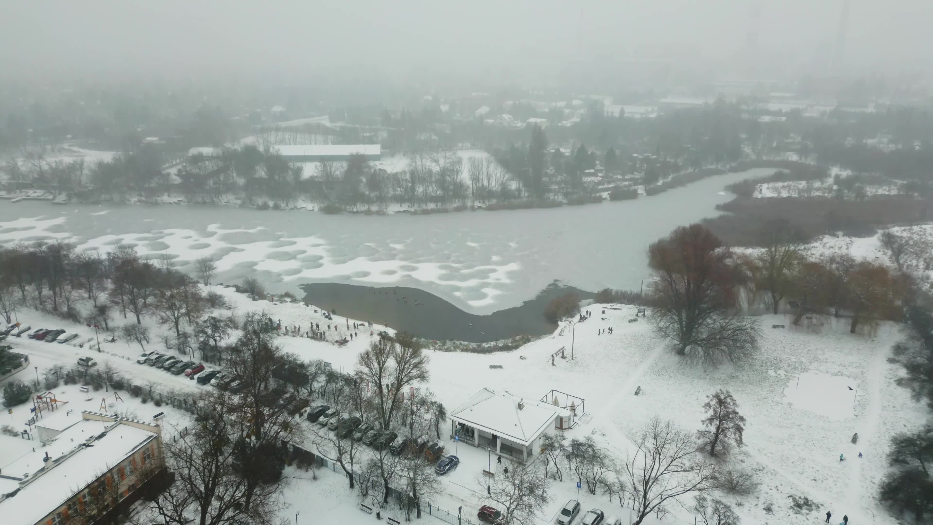 Winter Swimmers in Warsaw During Snowstorm