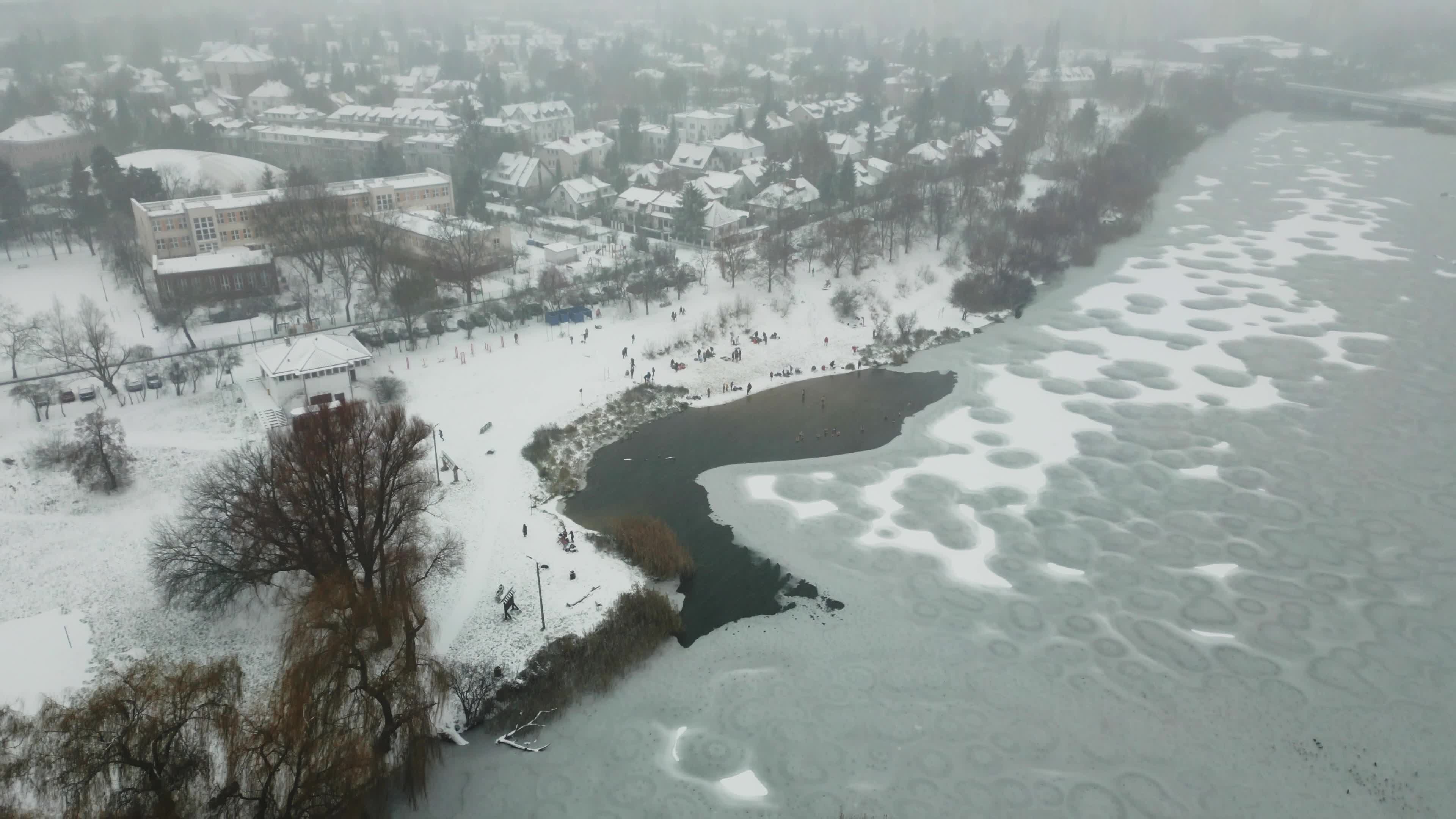 Winter Swimmers in Warsaw During Snowstorm