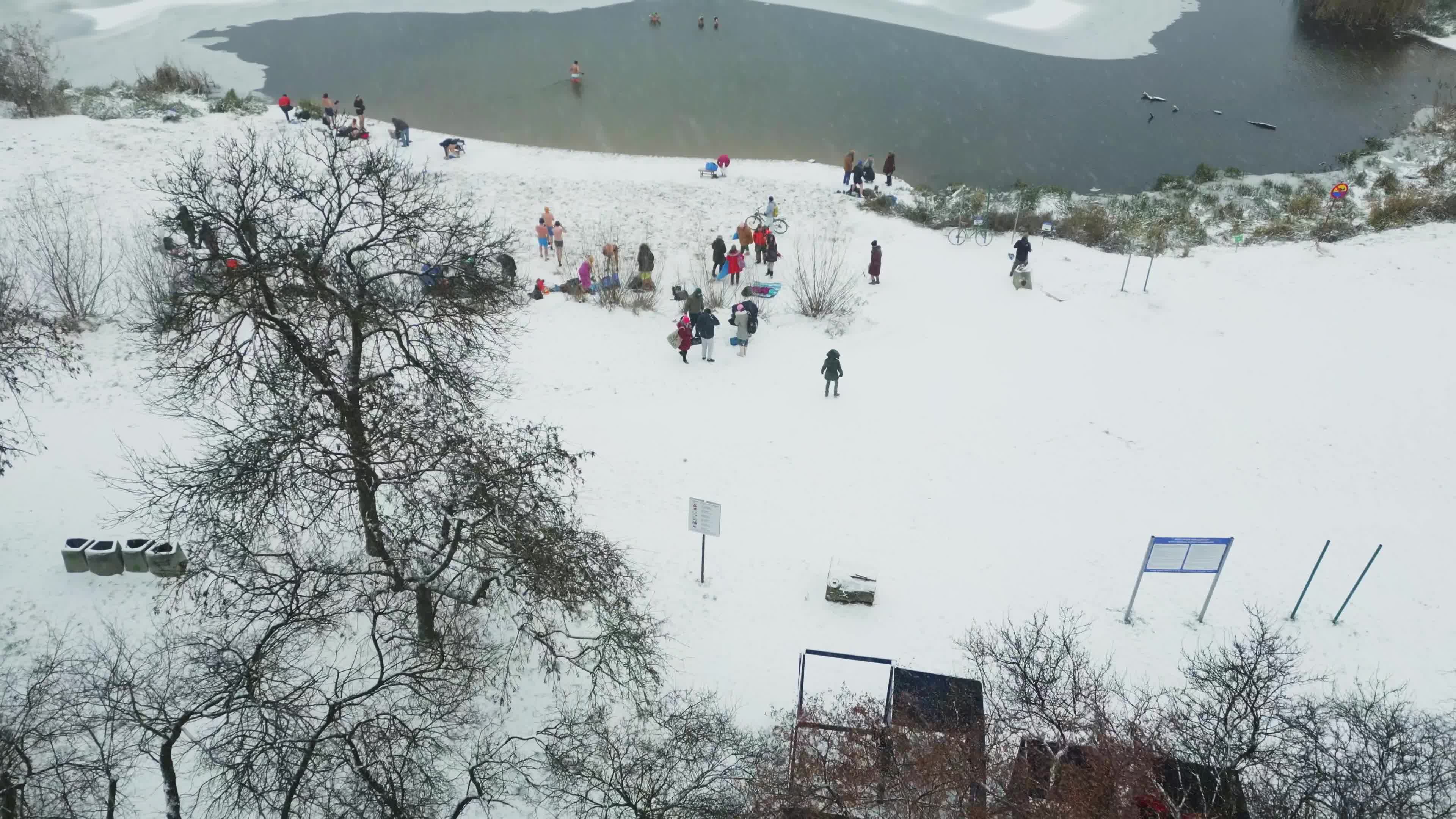 Winter Swimmers in Warsaw During Snowstorm