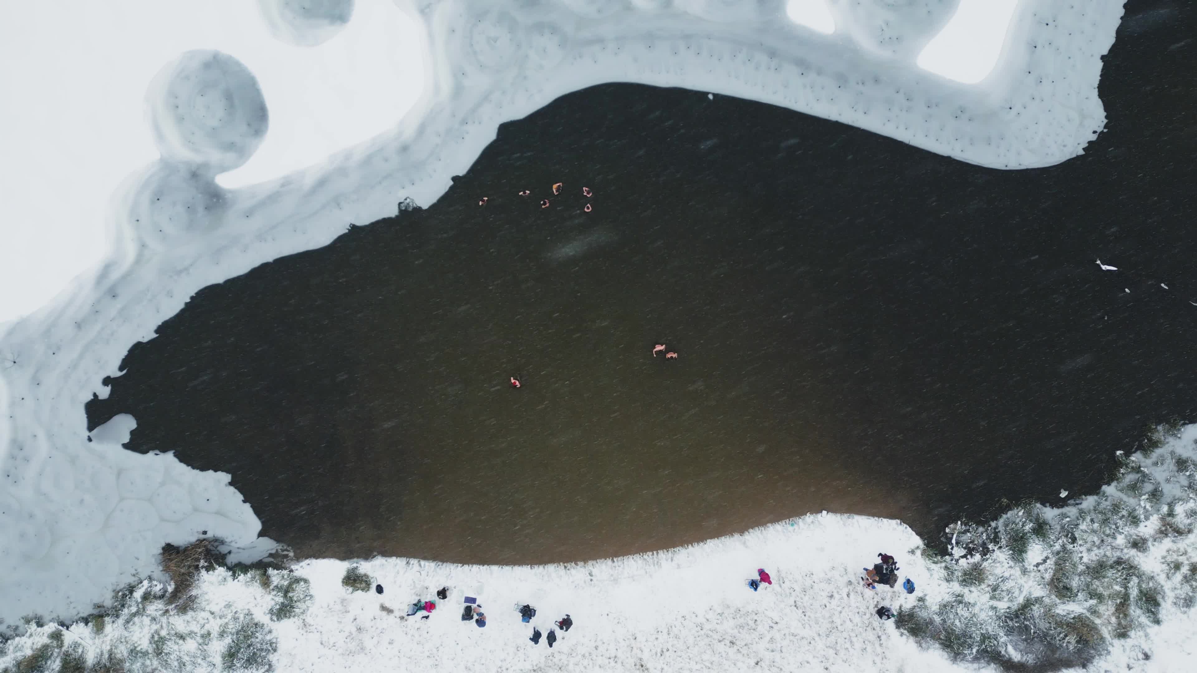 Winter Swimmers in Warsaw During Snowstorm