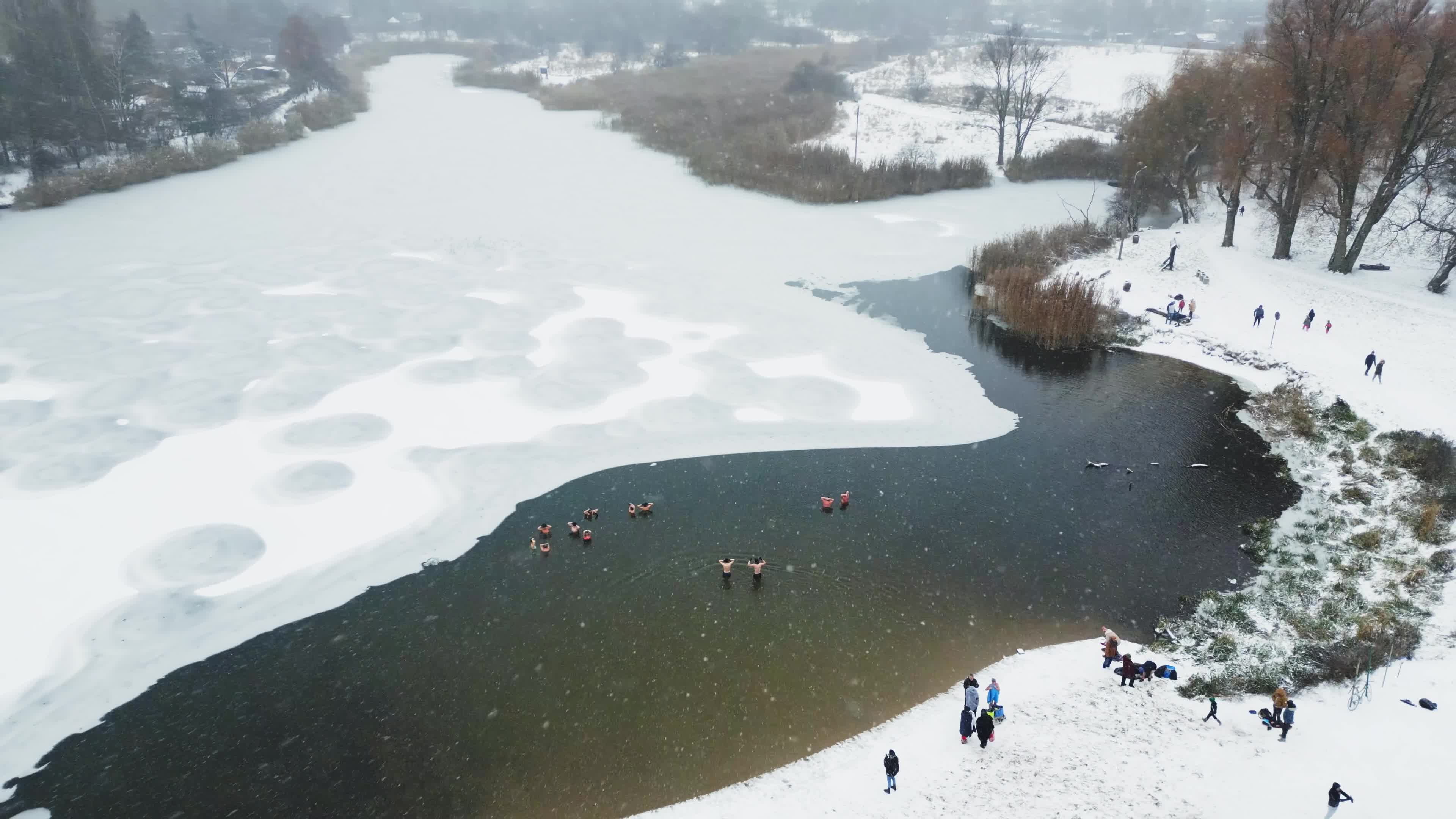 Winter Swimmers in Warsaw During Snowstorm