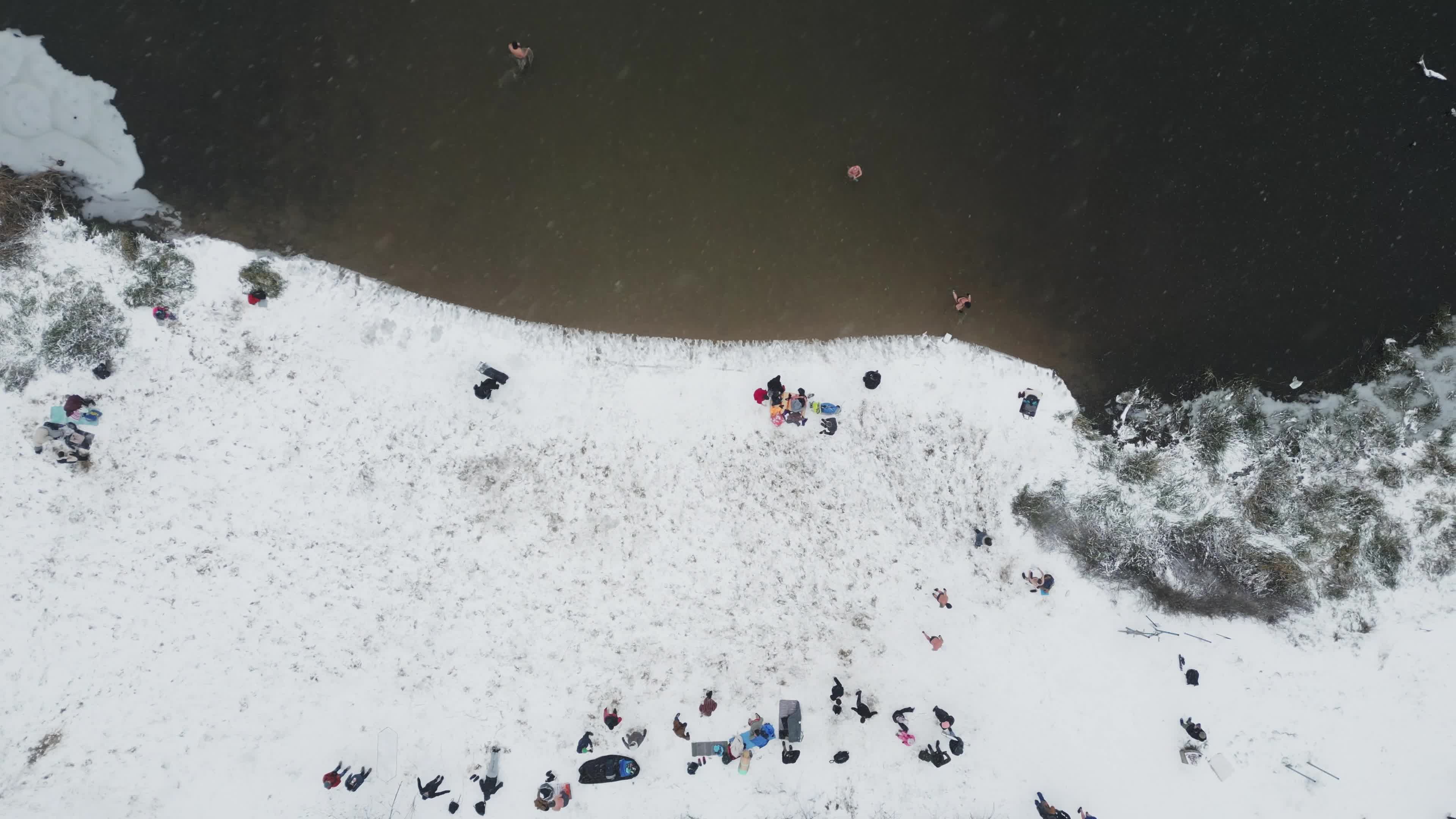 Winter Swimmers in Warsaw During Snowstorm
