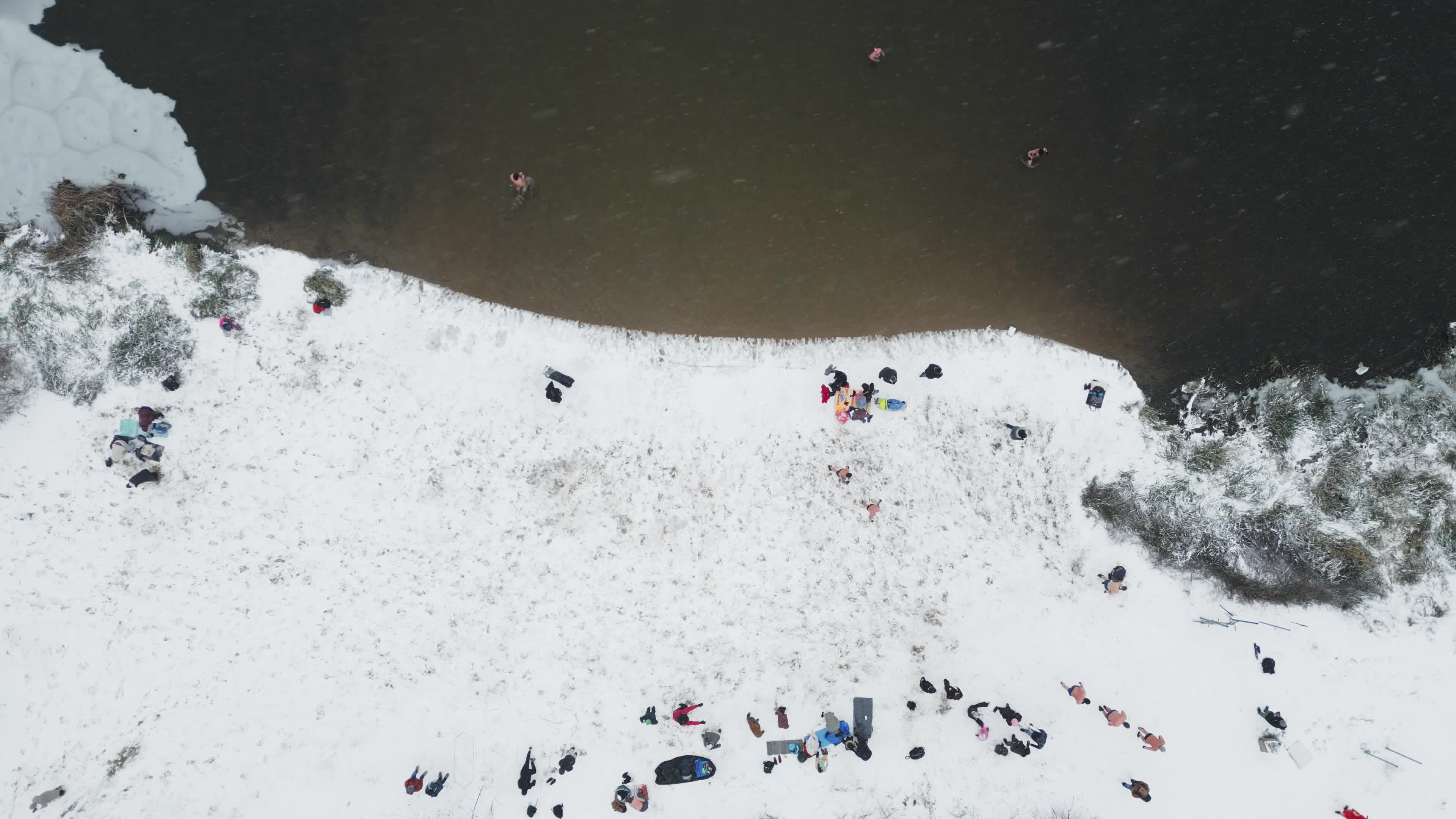 Winter Swimmers in Warsaw During Snowstorm