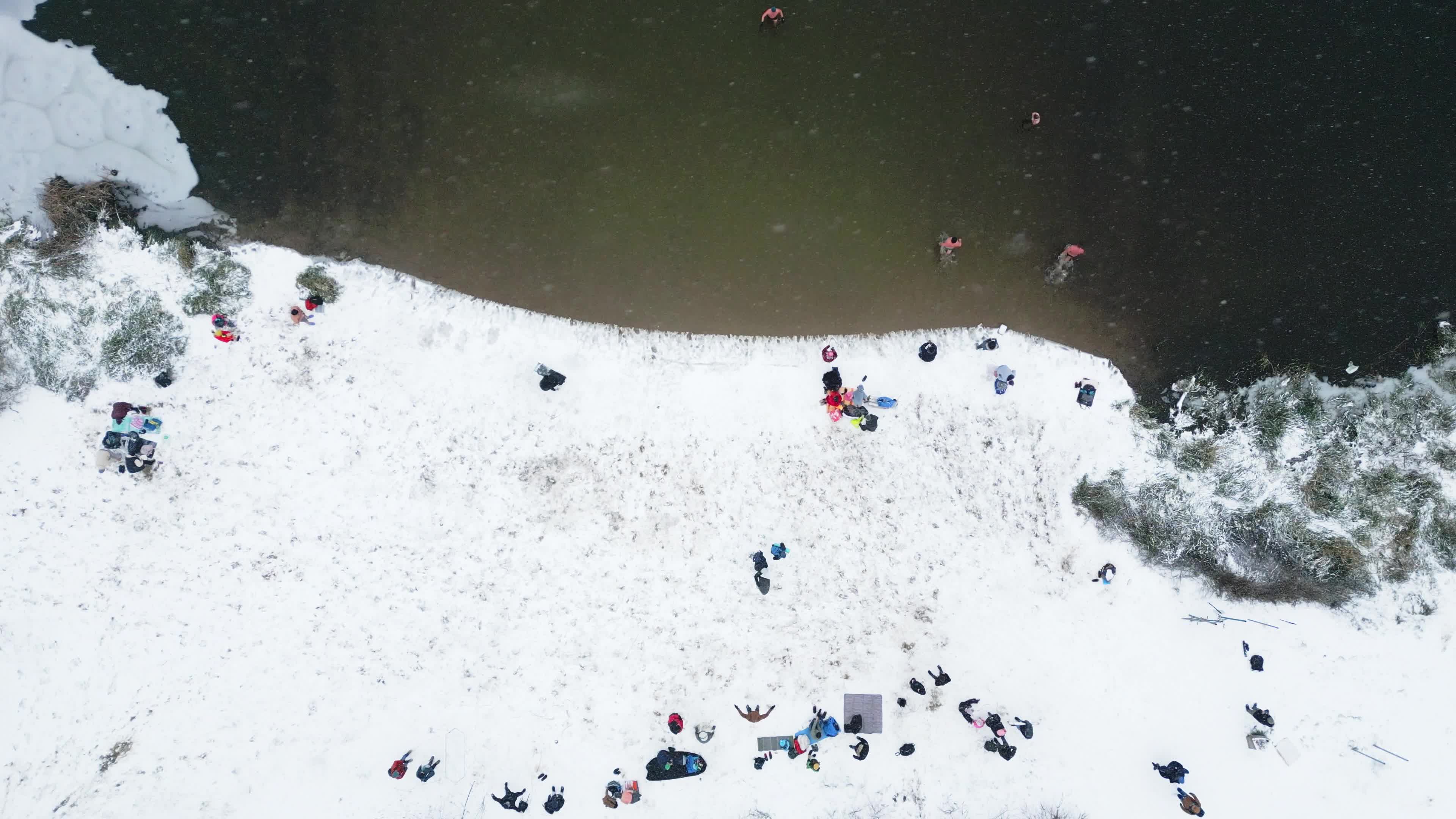 Winter Swimmers in Warsaw During Snowstorm