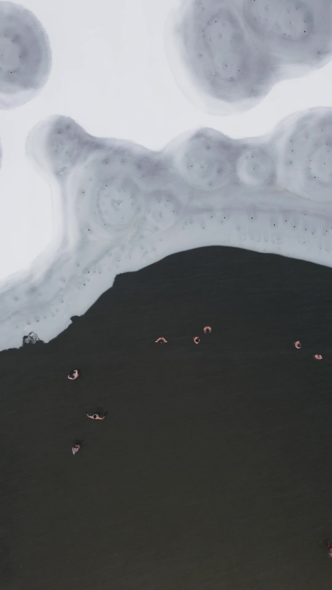 Winter Swimmers in Warsaw During Snowstorm Seen from the Air