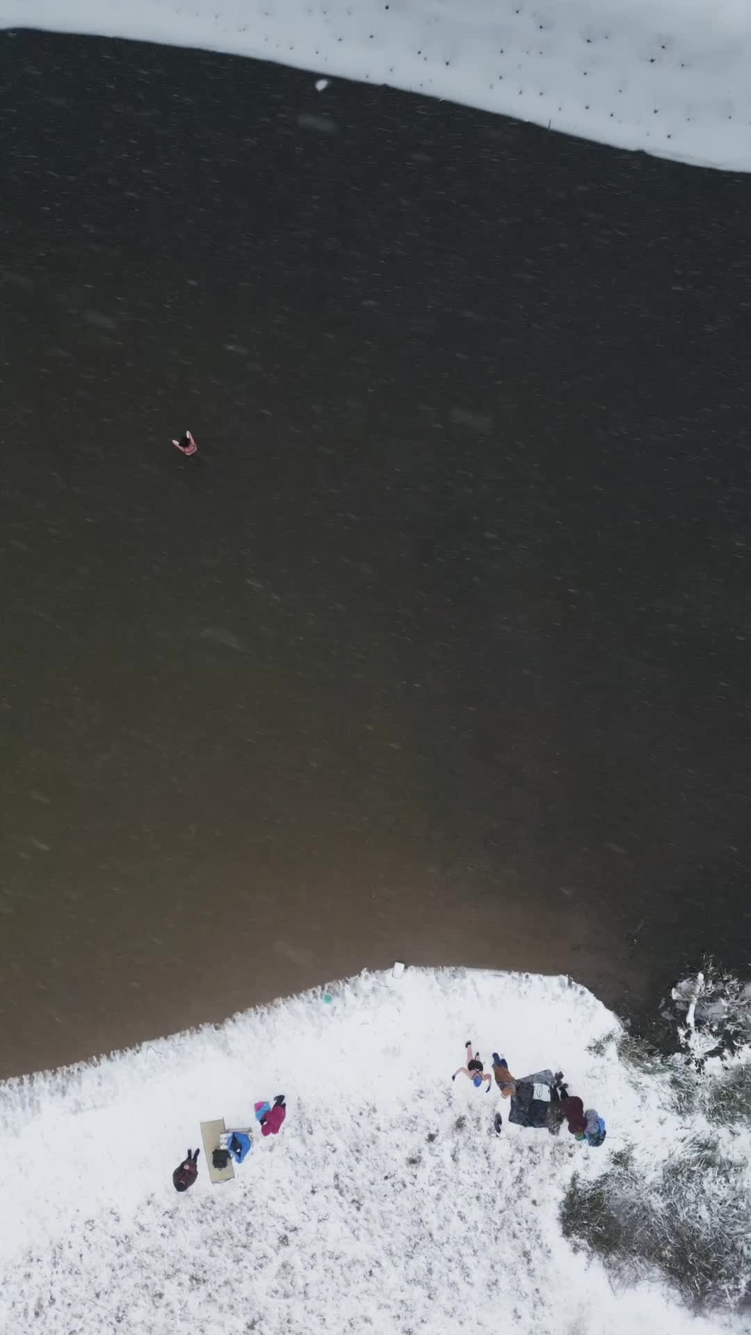 Winter Swimmers in Warsaw During Snowstorm Seen from the Air
