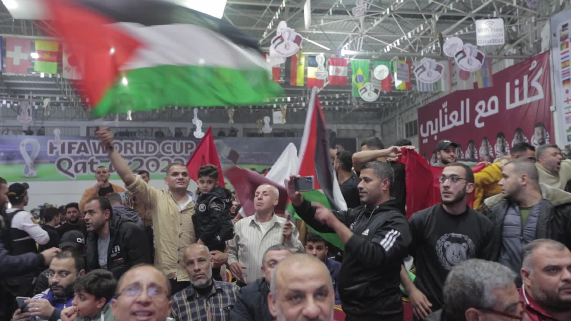 Palestinians Watch The Quarter-Final Match Between Morocco v Portugal