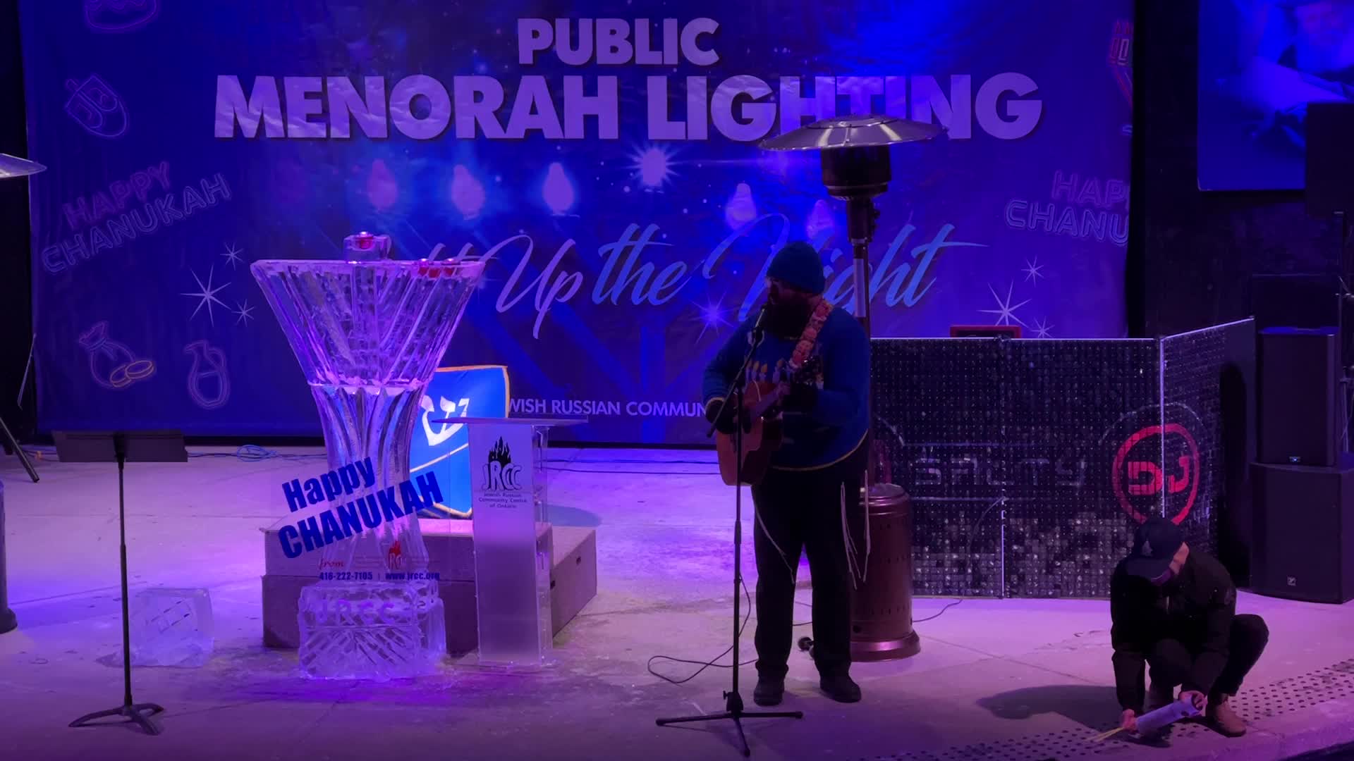 Jews celebrate Chanukah by lighting of a giant menorah made of ice
