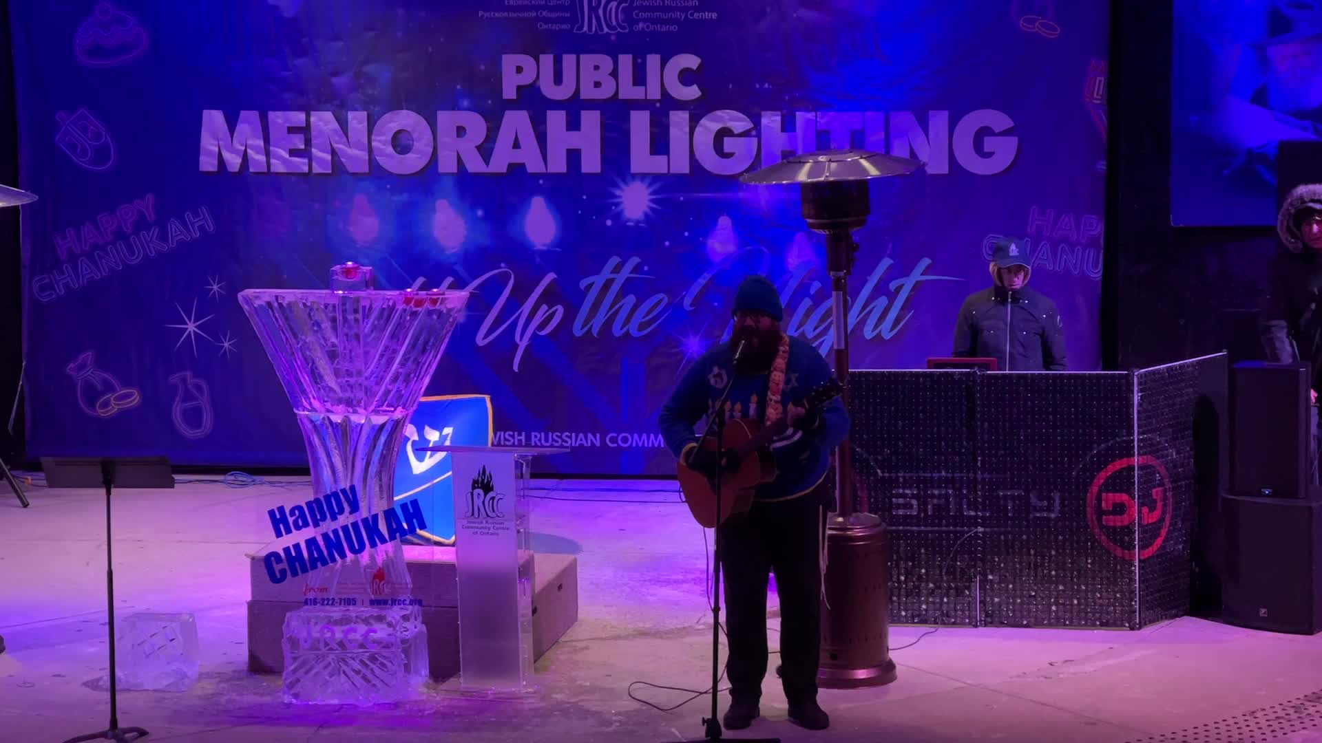 Jews celebrate Chanukah by lighting of a giant menorah made of ice
