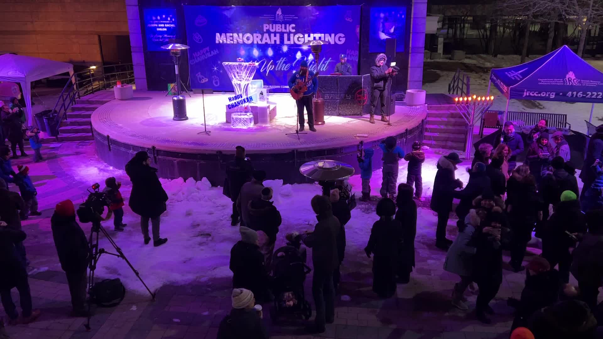 Jews celebrate Chanukah by lighting of a giant menorah made of ice