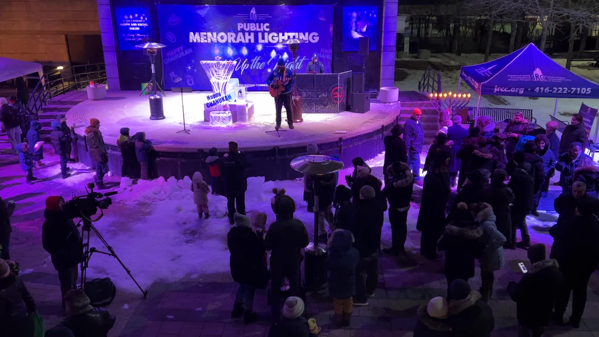 Jews celebrate Chanukah by lighting of a giant menorah made of ice