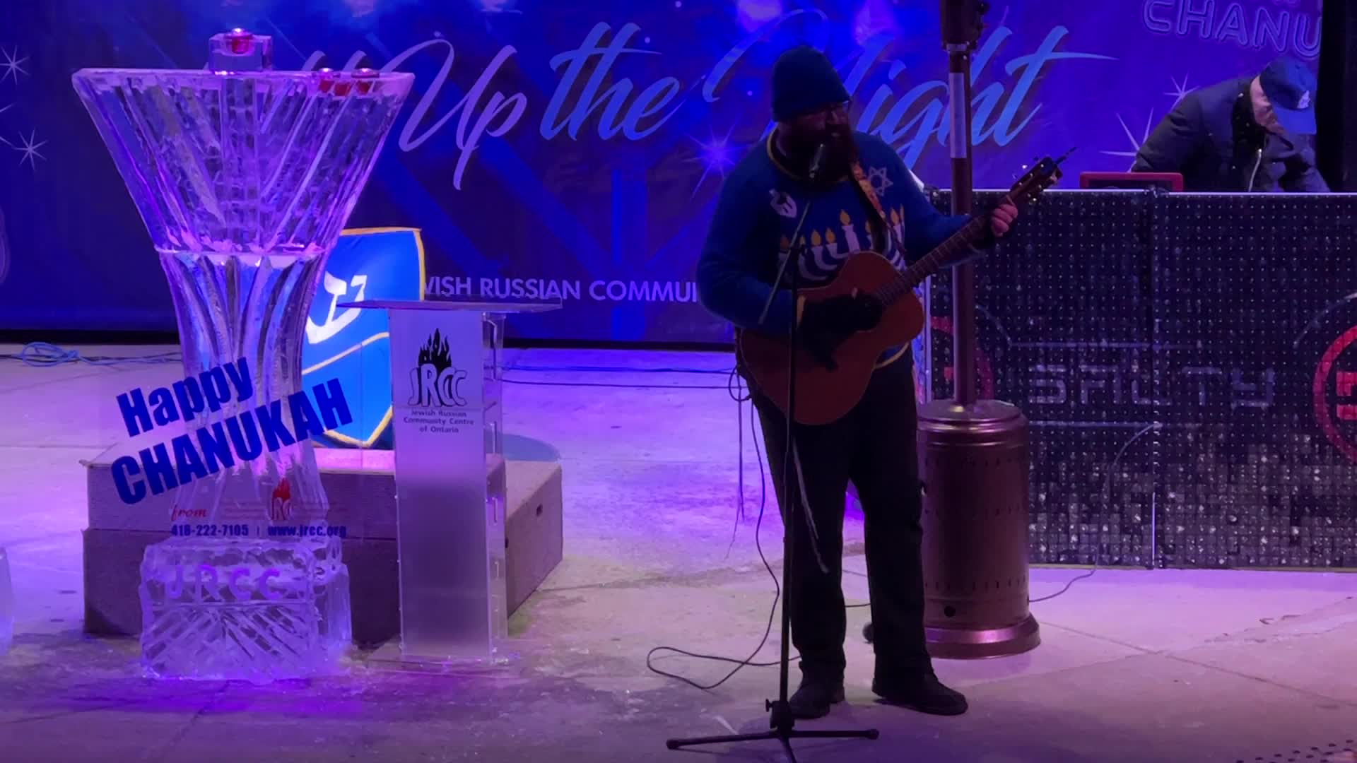 Jews celebrate Chanukah by lighting of a giant menorah made of ice