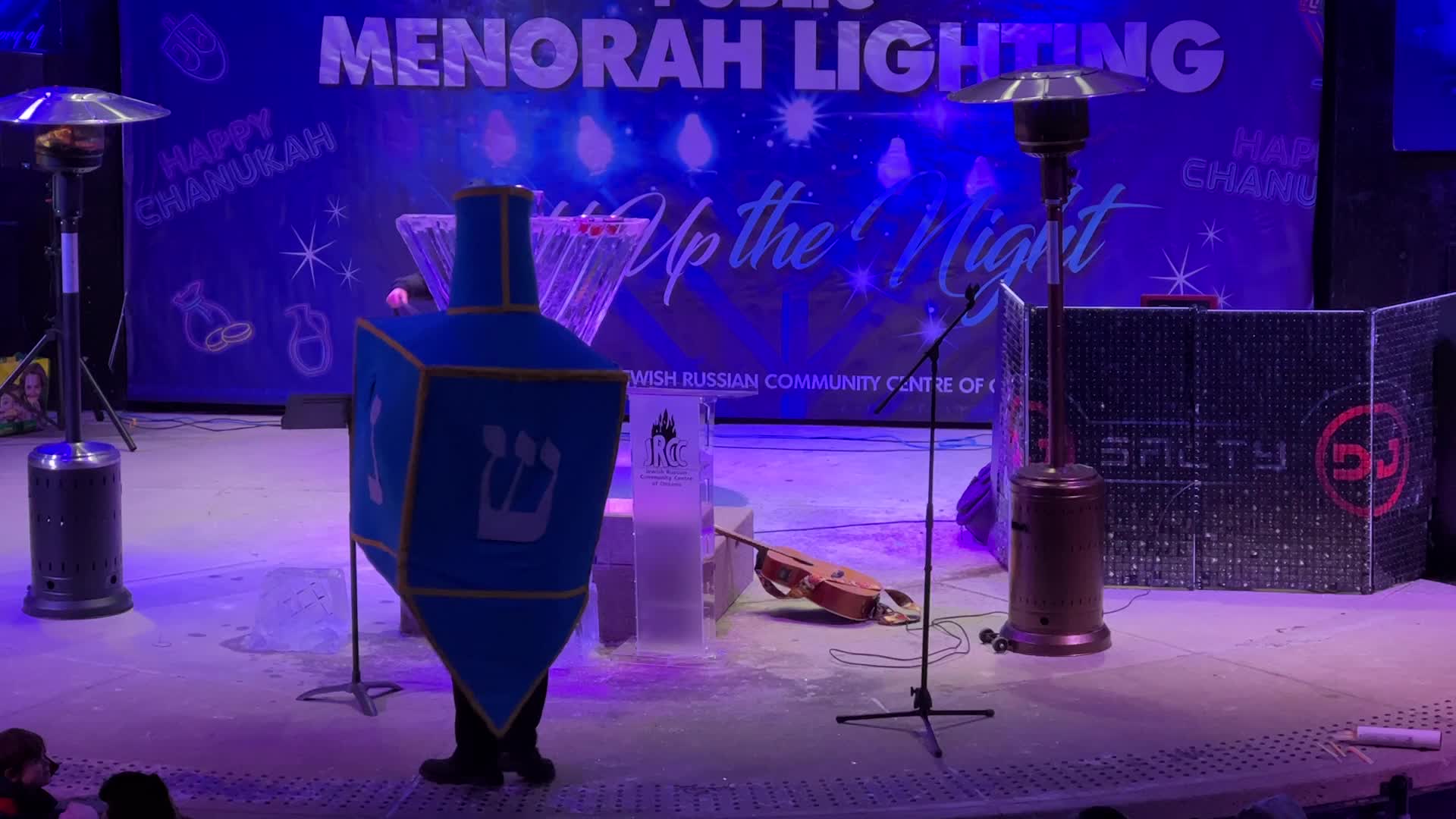 Jews celebrate Chanukah by lighting of a giant menorah made of ice