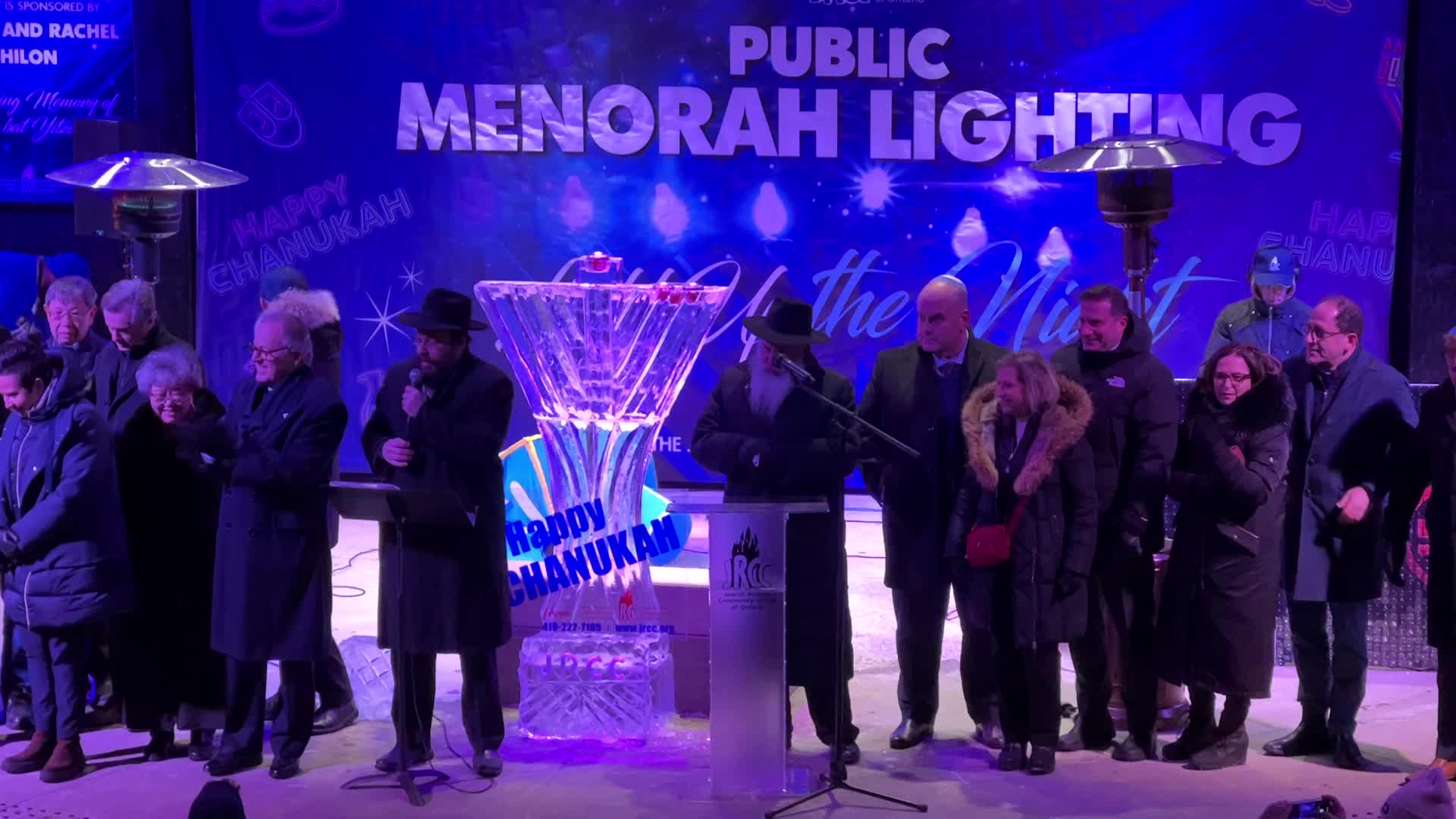 Jews celebrate Chanukah by lighting of a giant menorah made of ice
