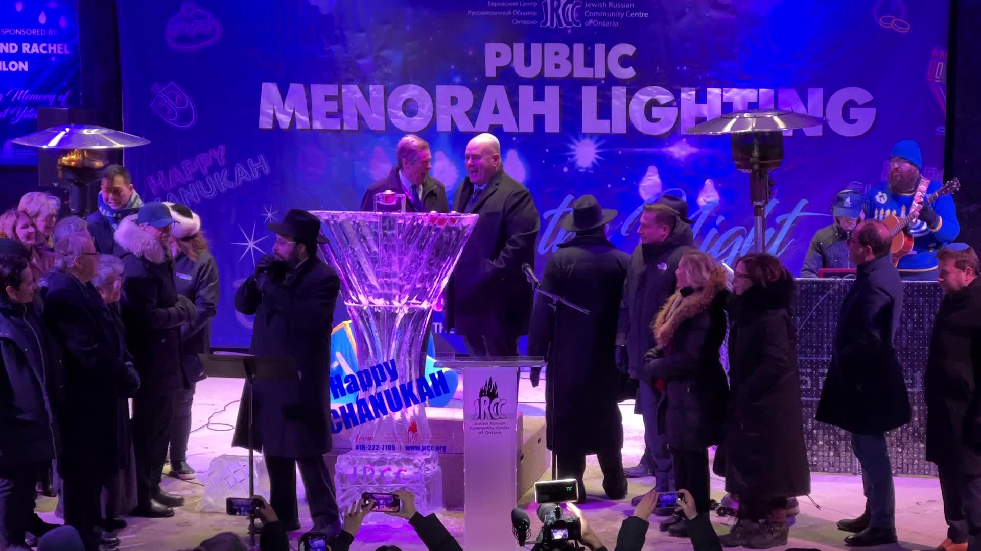Jews celebrate Chanukah by lighting of a giant menorah made of ice