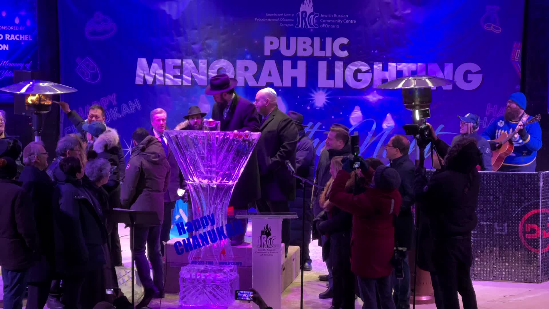 Jews celebrate Chanukah by lighting of a giant menorah made of ice