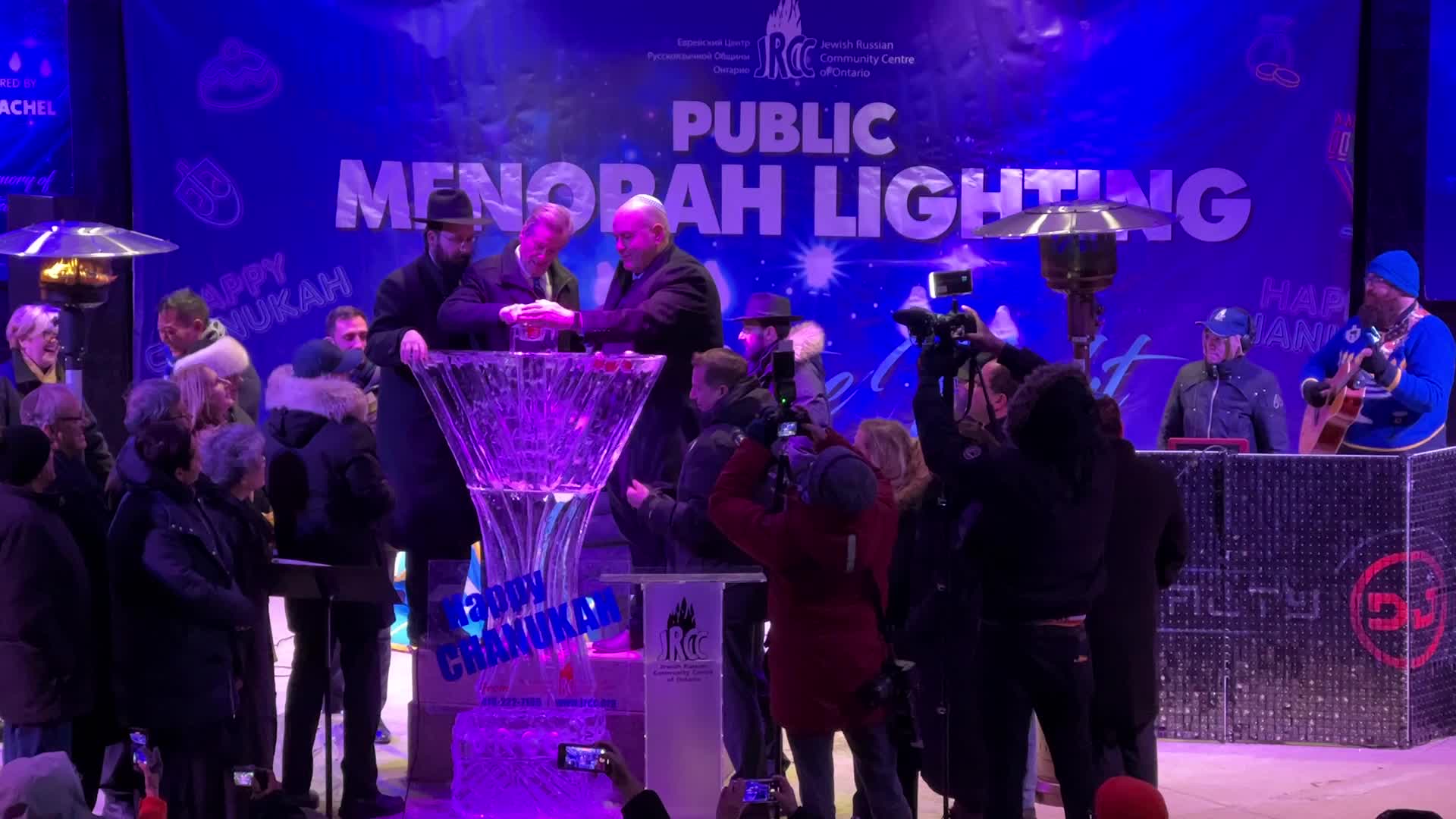 Jews celebrate Chanukah by lighting of a giant menorah made of ice