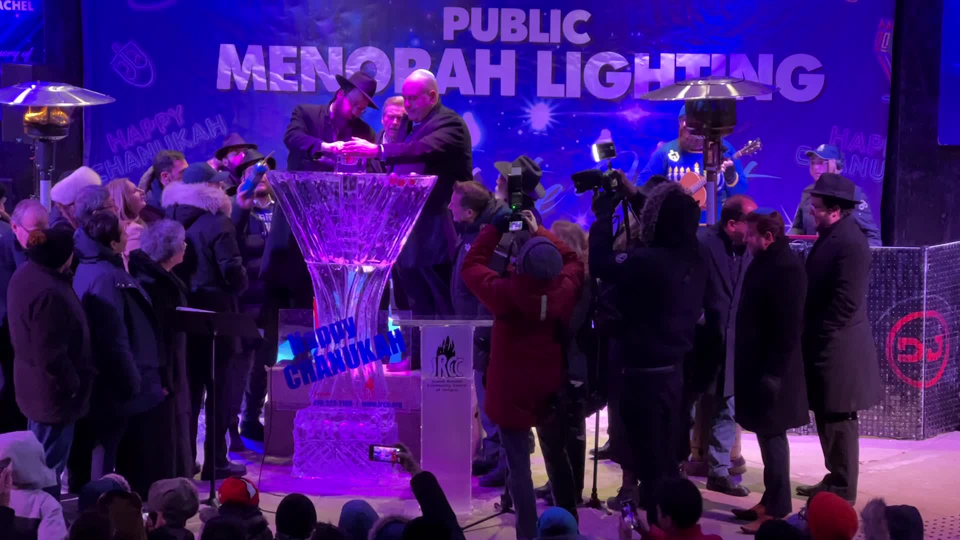 Jews celebrate Chanukah by lighting of a giant menorah made of ice