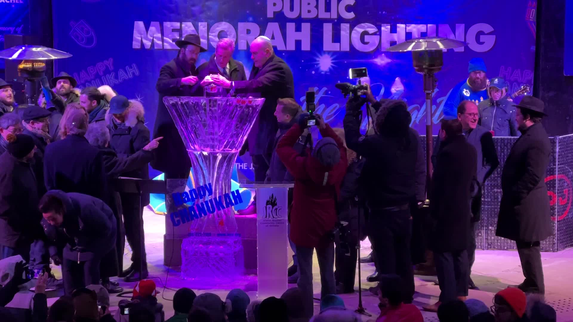 Jews celebrate Chanukah by lighting of a giant menorah made of ice