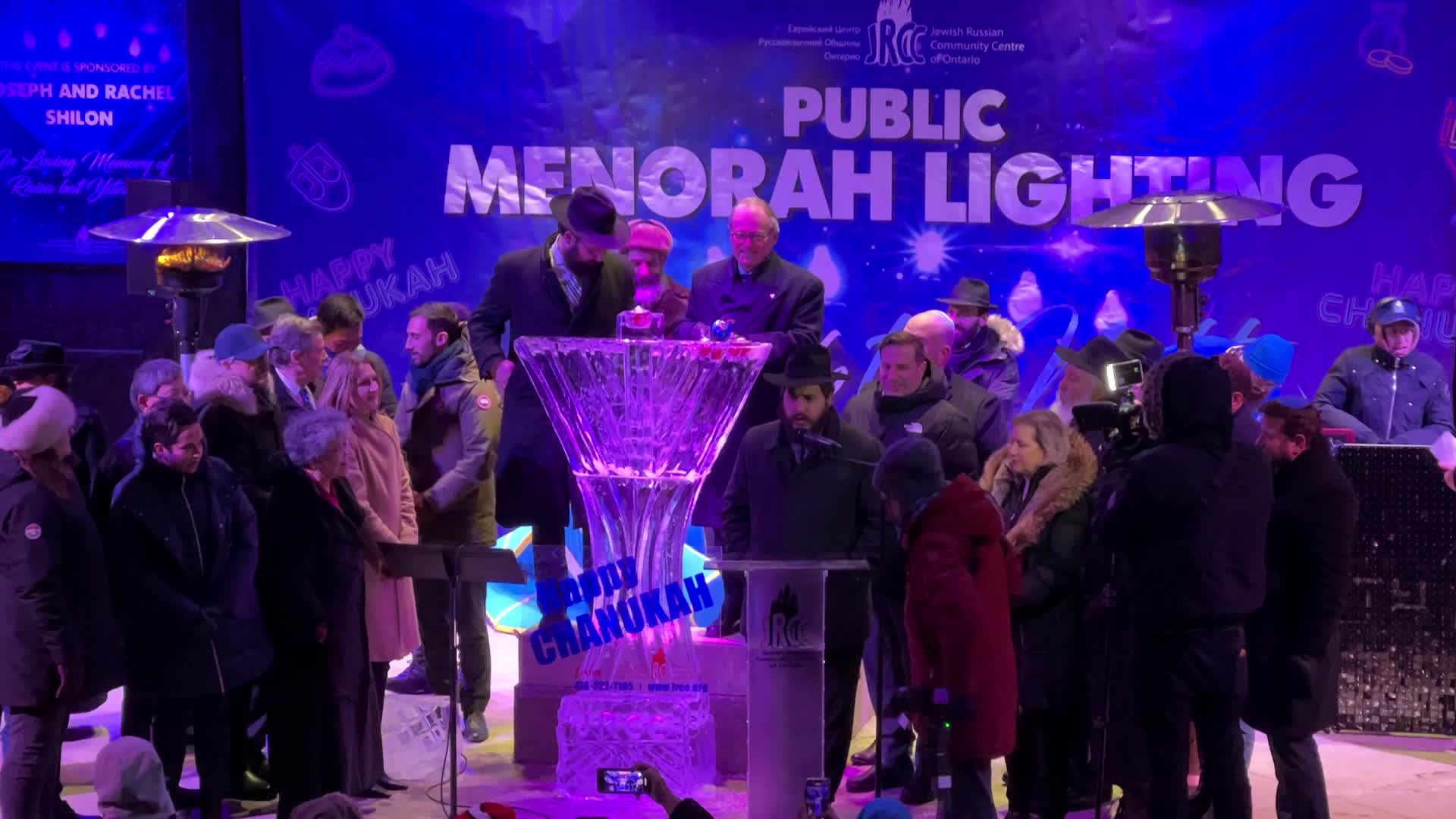 Jews celebrate Chanukah by lighting of a giant menorah made of ice