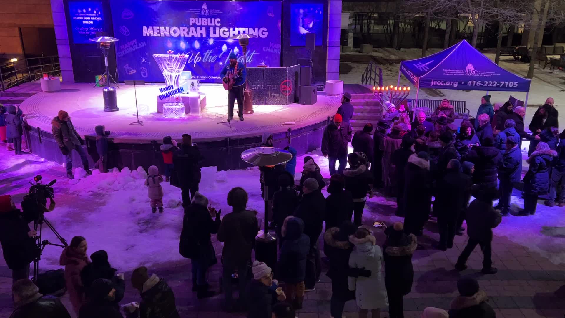 Jews celebrate Chanukah by lighting of a giant menorah made of ice