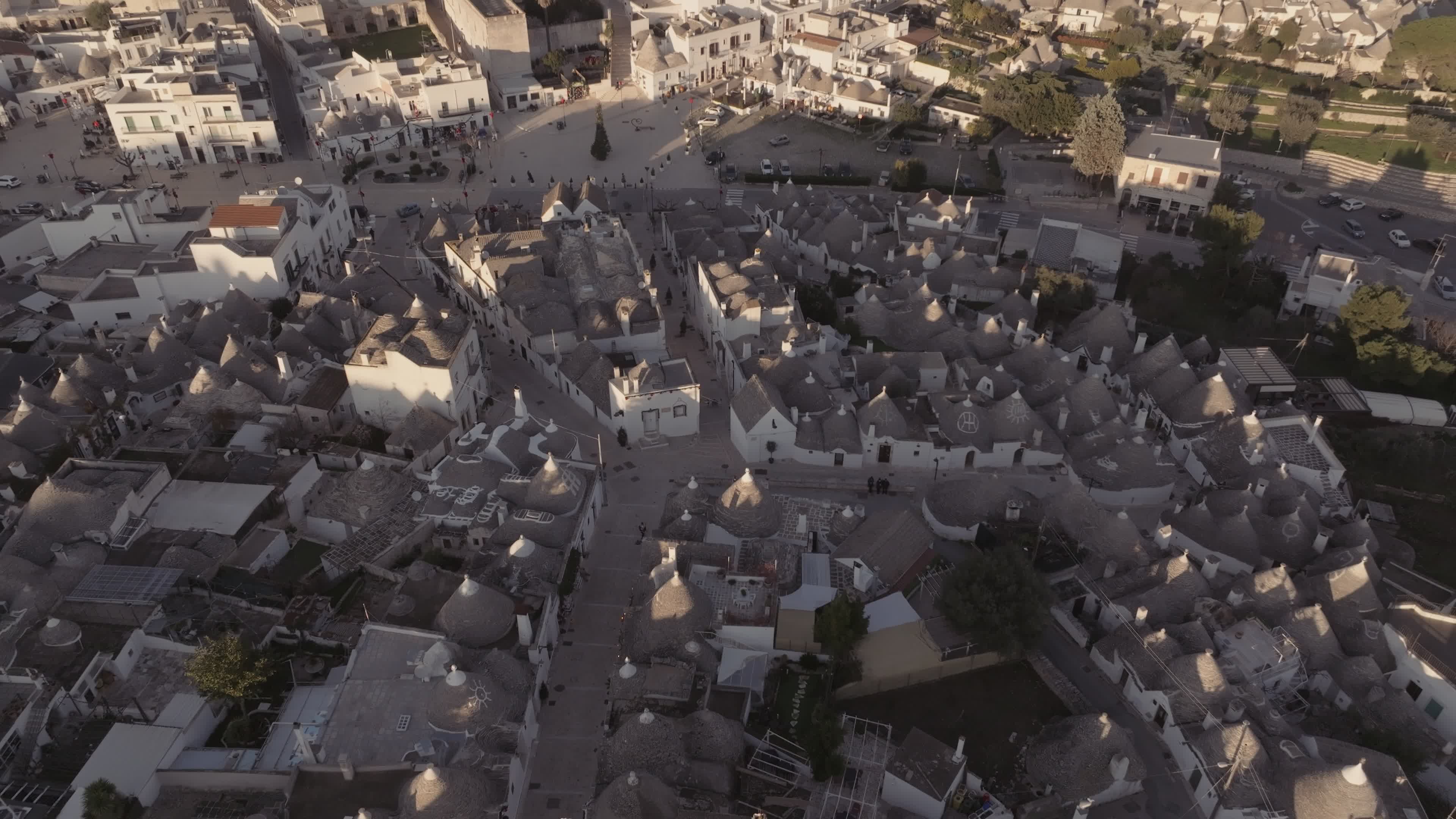 Drone View Of UNESCO World Heritage-listed Trulli Of Alberobello At Sunset