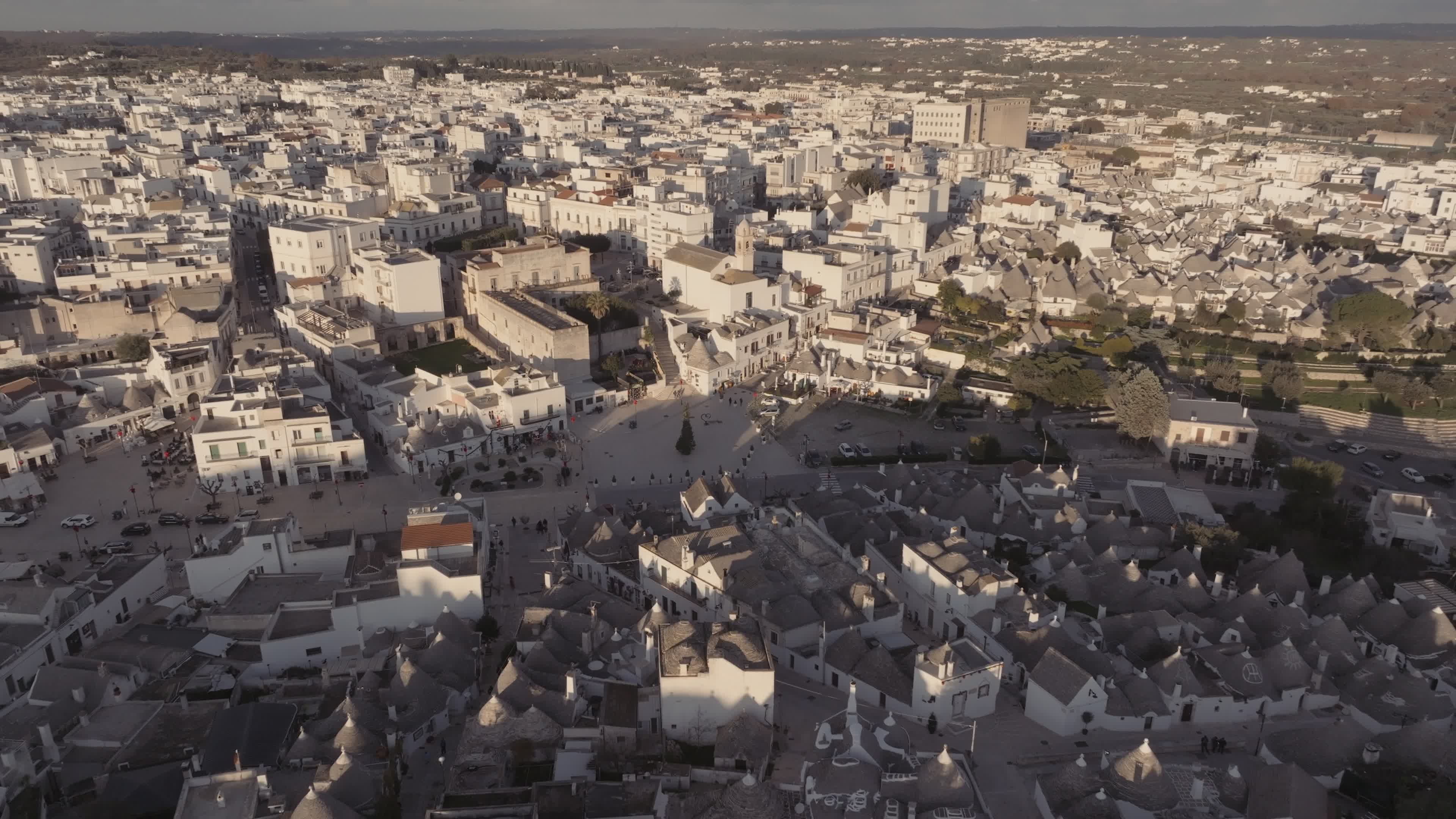 Drone View Of UNESCO World Heritage-listed Trulli Of Alberobello At Sunset