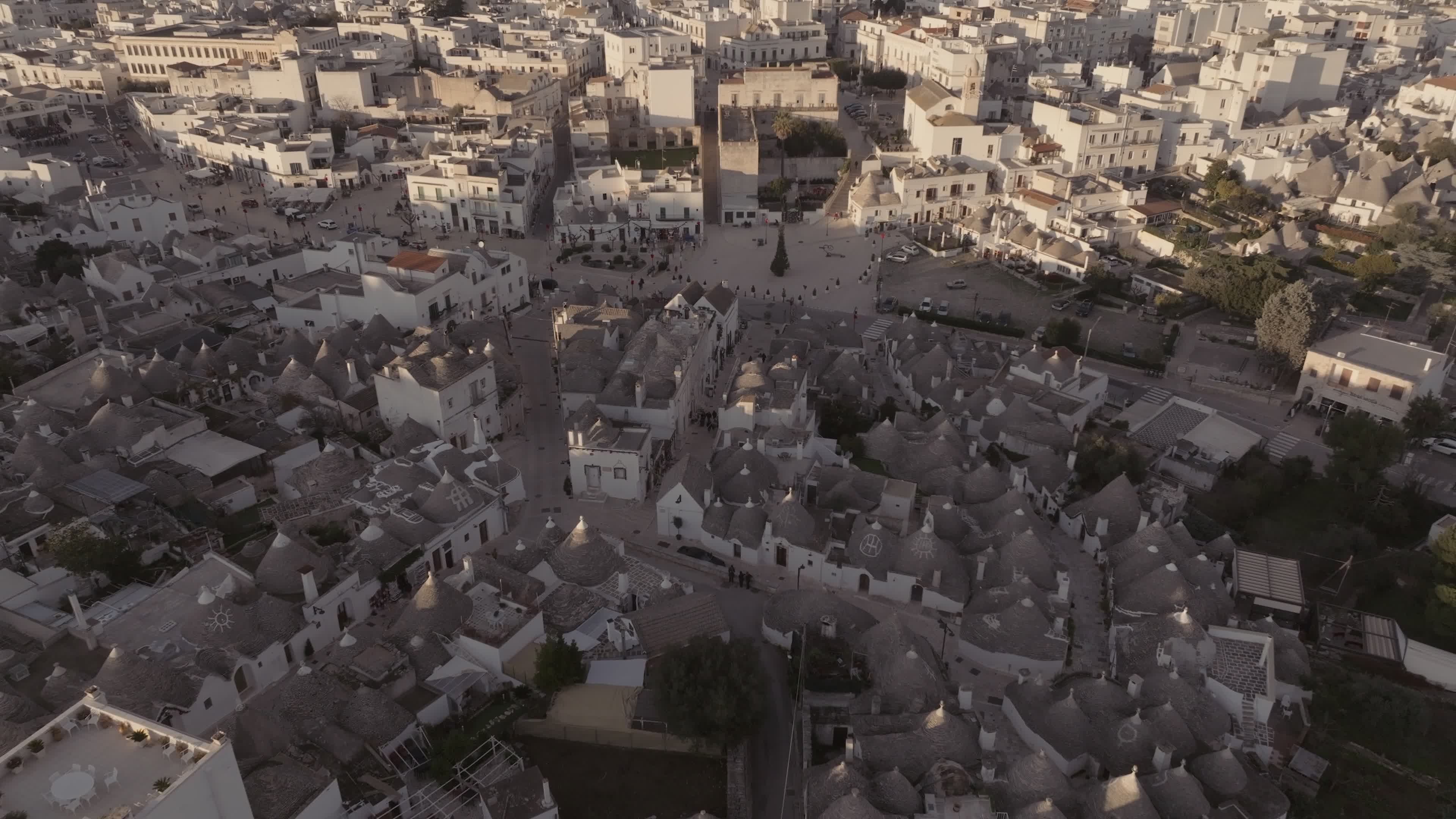 Drone View Of UNESCO World Heritage-listed Trulli Of Alberobello At Sunset