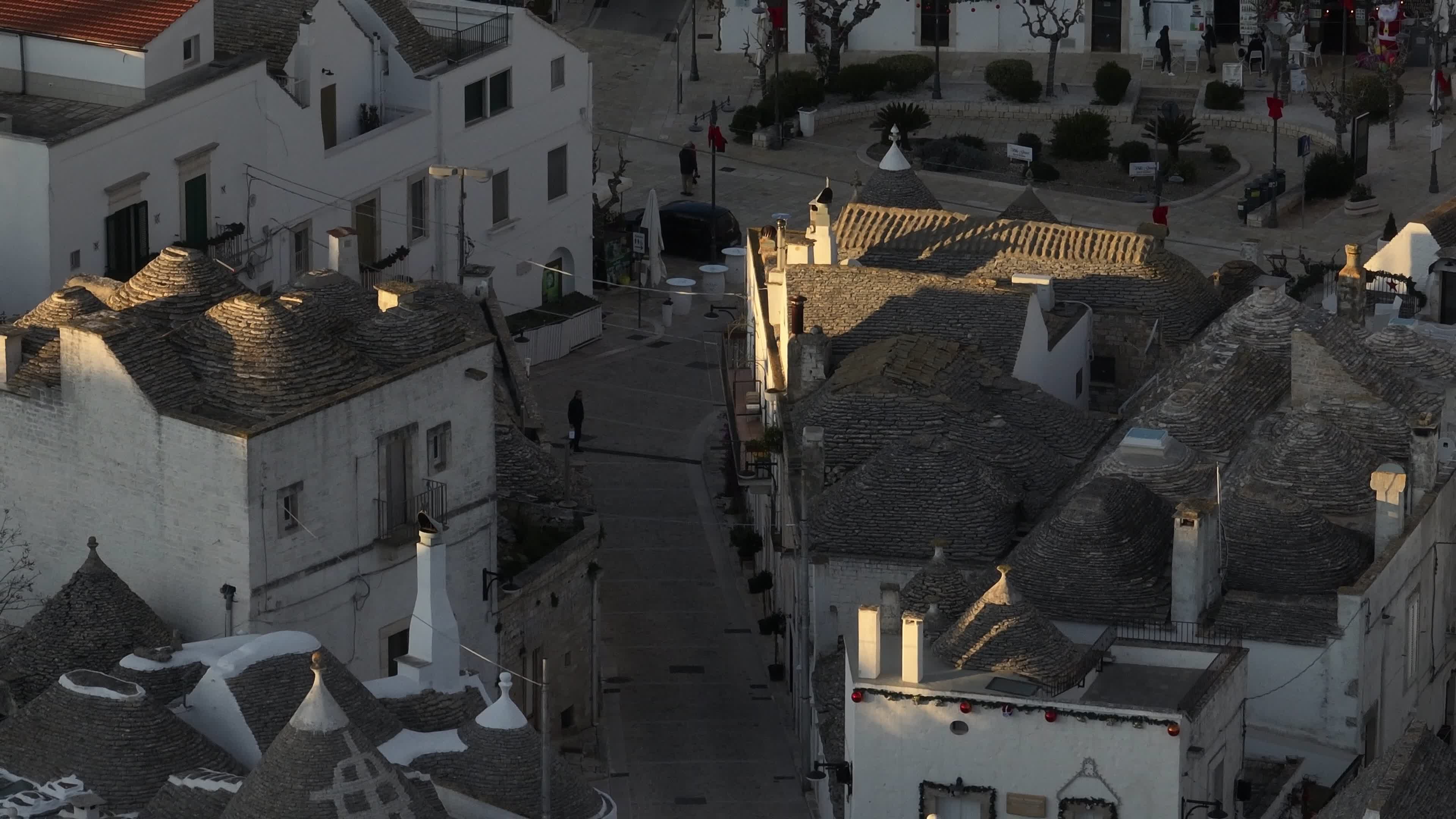 Drone View Of UNESCO World Heritage-listed Trulli Of Alberobello At Sunset