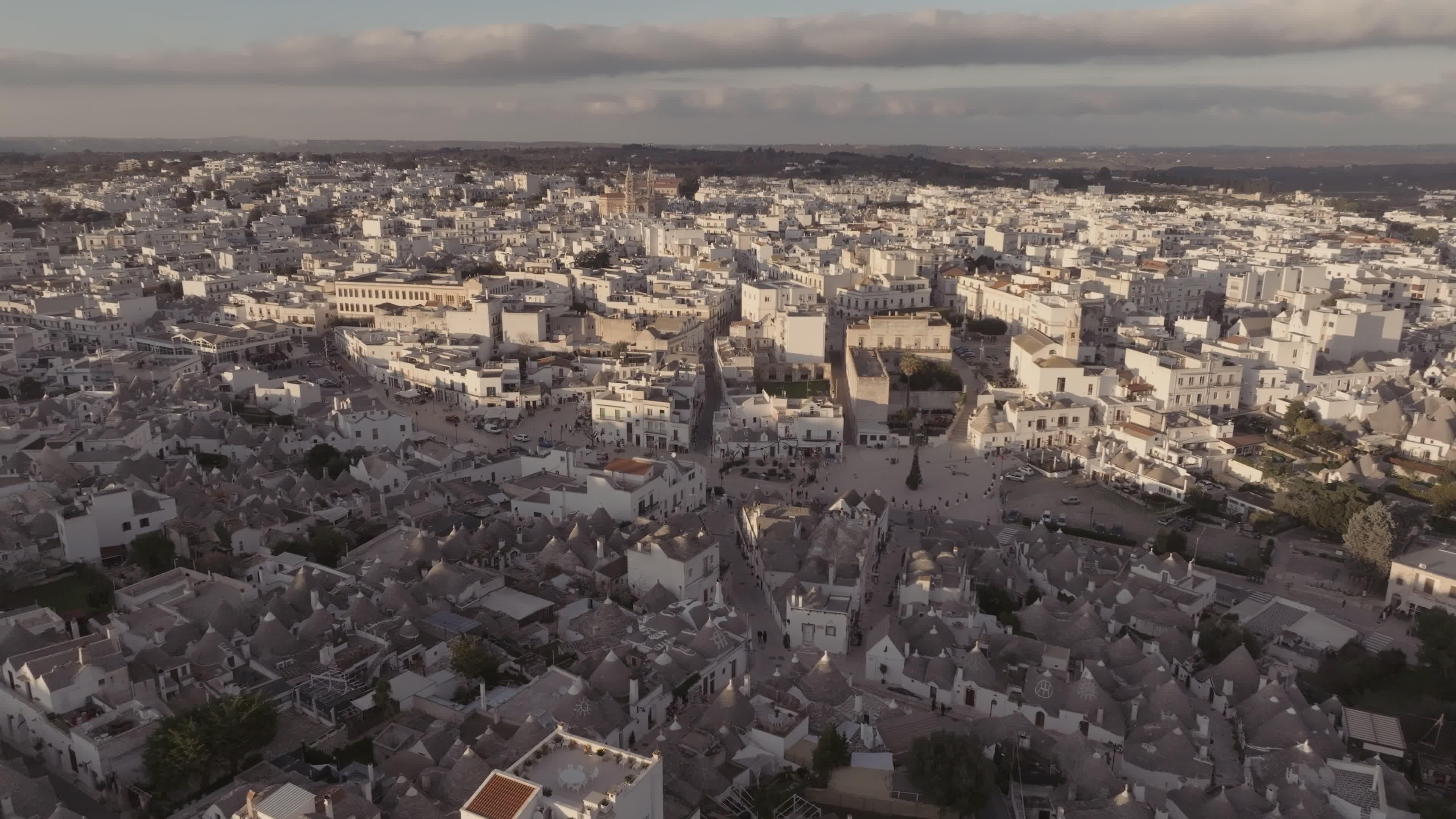 Drone View Of UNESCO World Heritage-listed Trulli Of Alberobello At Sunset