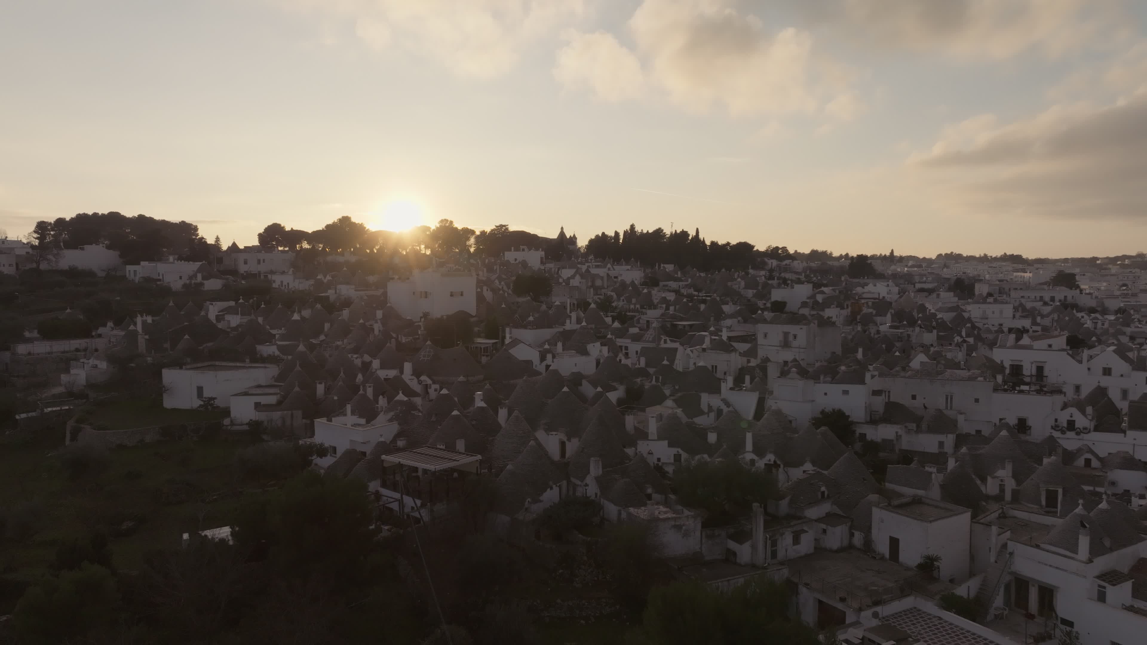 Drone View Of UNESCO World Heritage-listed Trulli Of Alberobello At Sunset