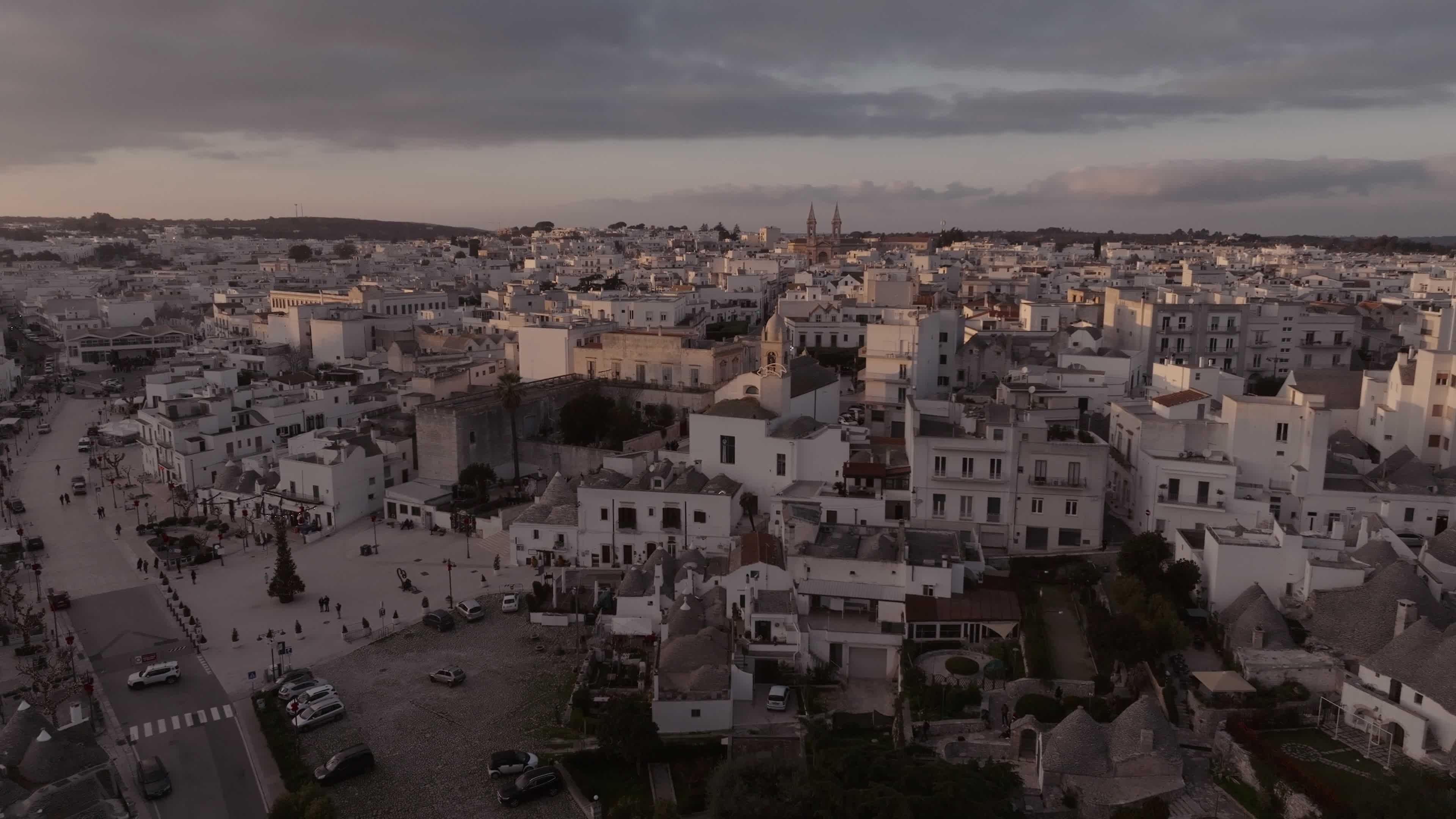 Drone View Of UNESCO World Heritage-listed Trulli Of Alberobello At Sunset