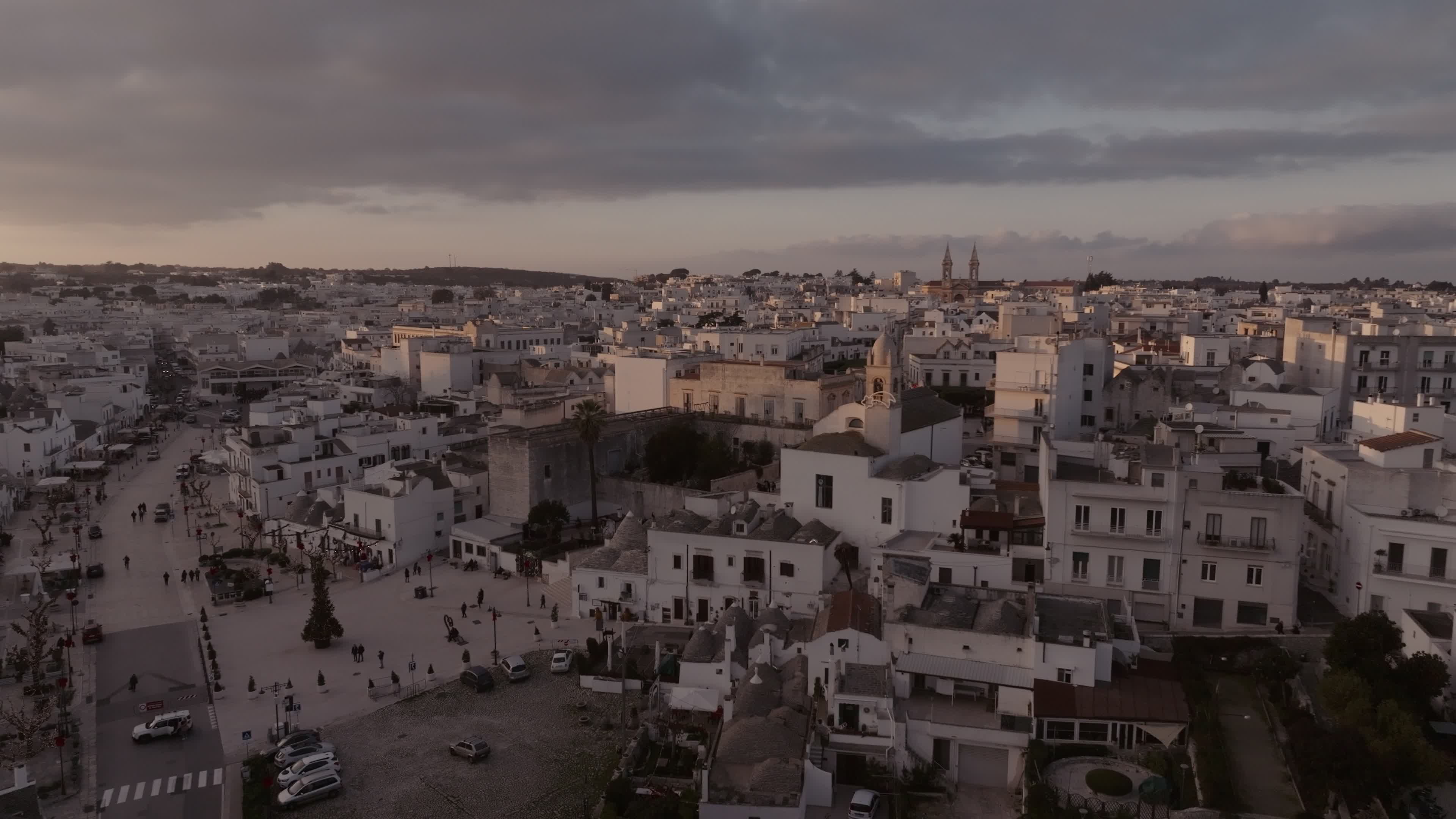Drone View Of UNESCO World Heritage-listed Trulli Of Alberobello At Sunset