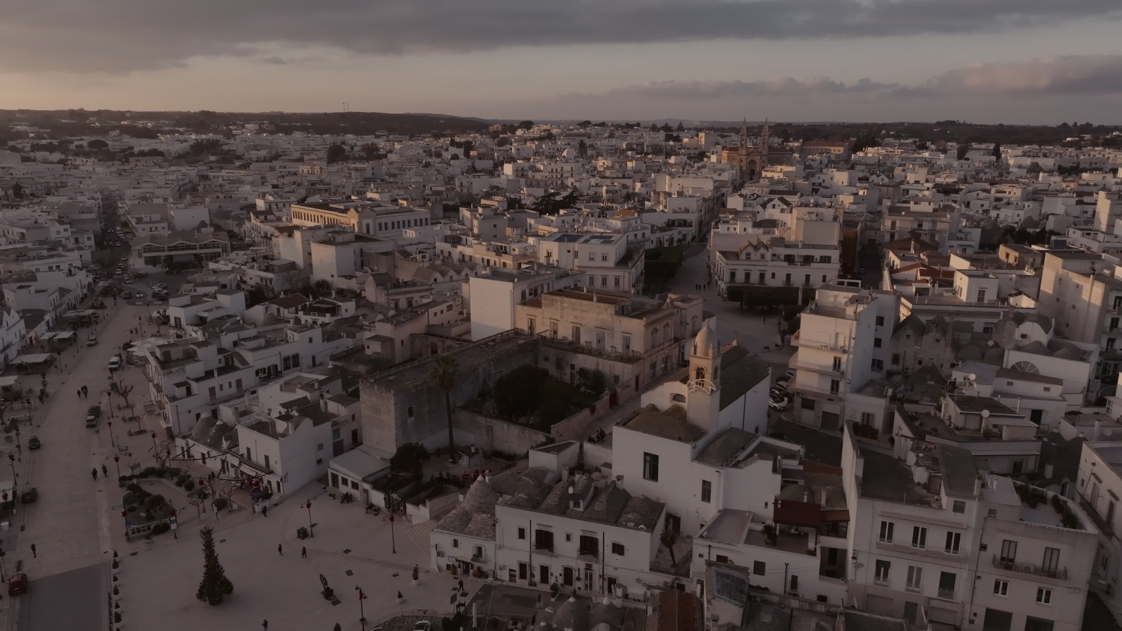 Drone View Of UNESCO World Heritage-listed Trulli Of Alberobello At Sunset