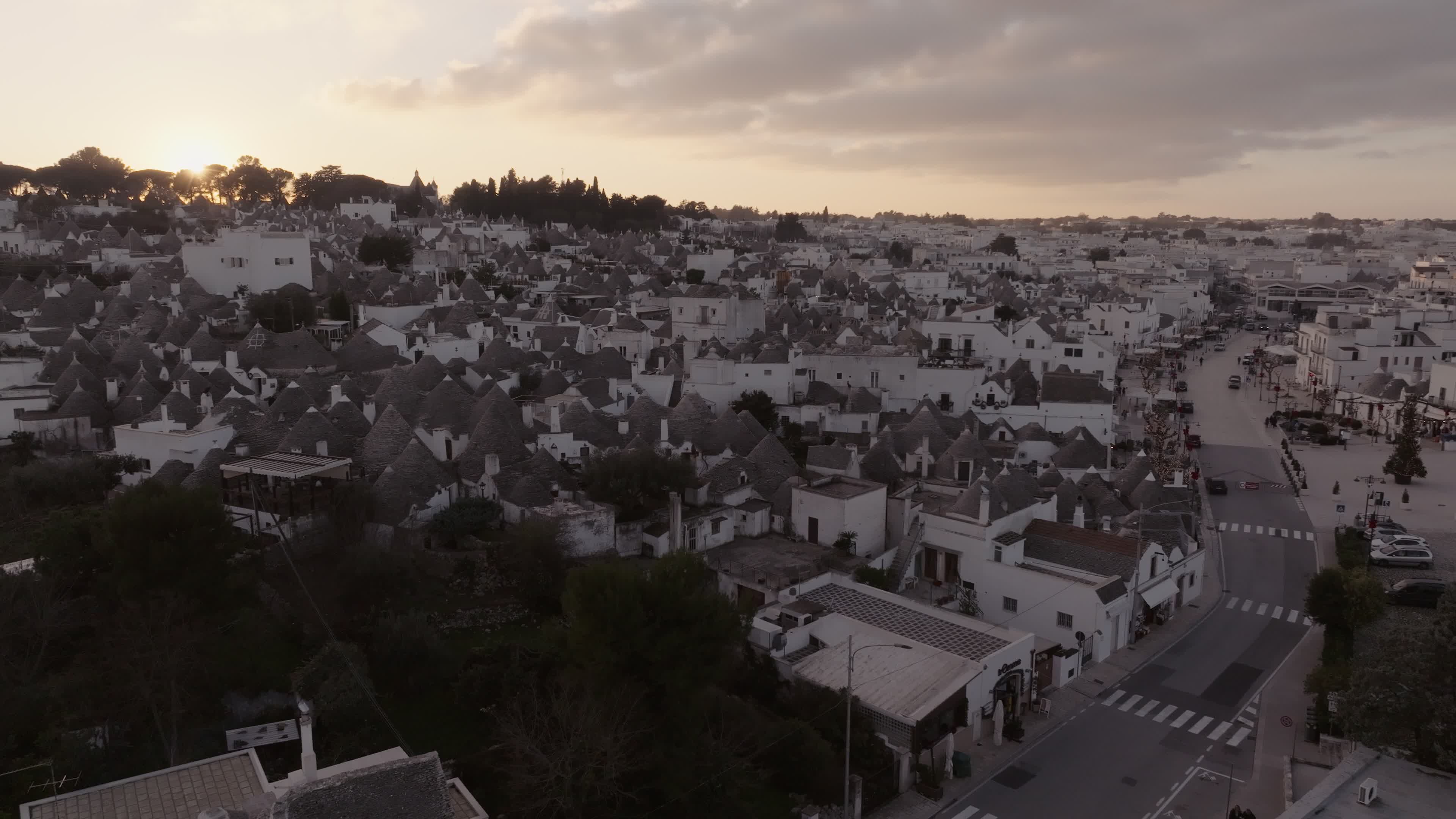 Drone View Of UNESCO World Heritage-listed Trulli Of Alberobello At Sunset