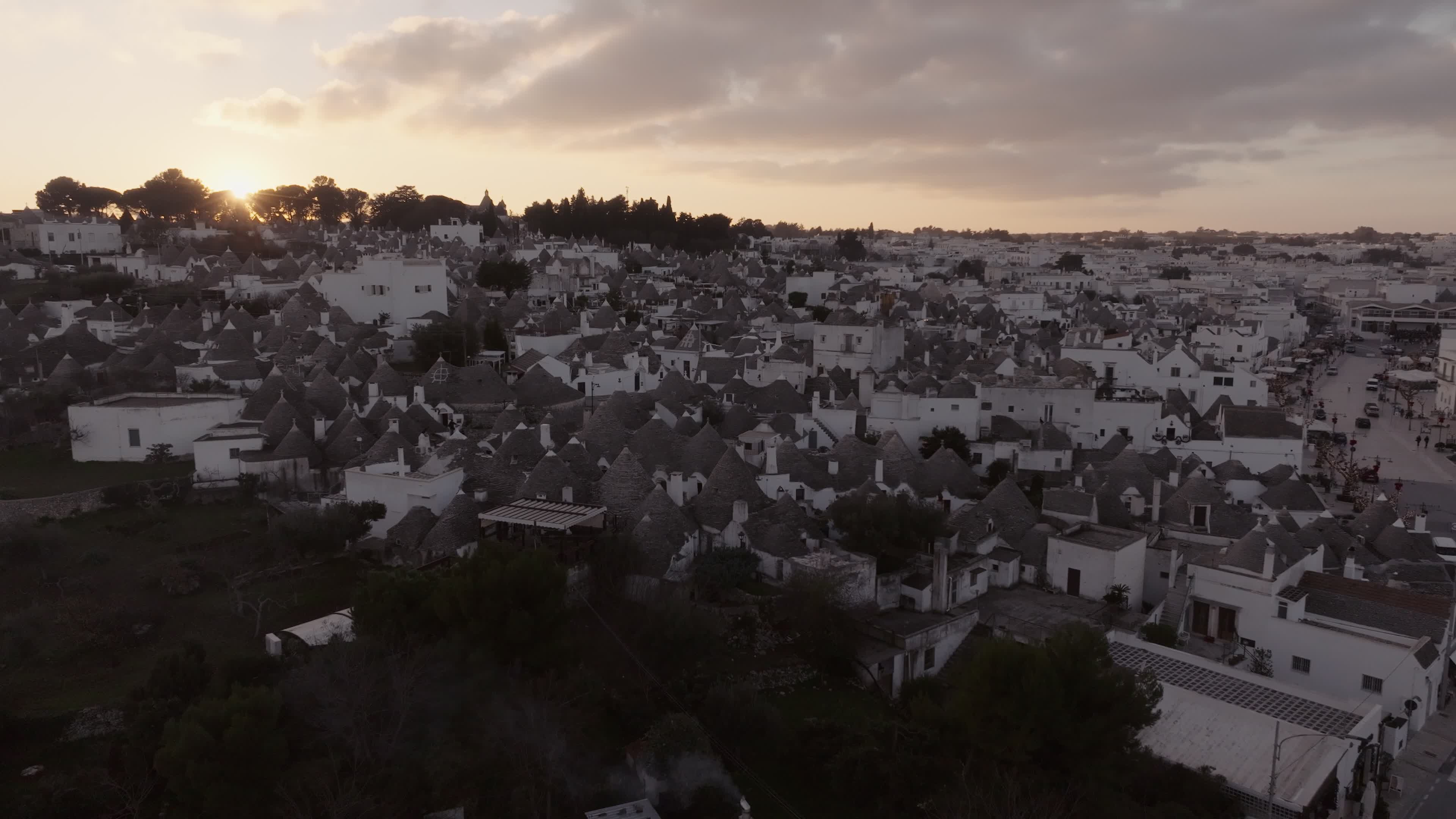 Drone View Of UNESCO World Heritage-listed Trulli Of Alberobello At Sunset