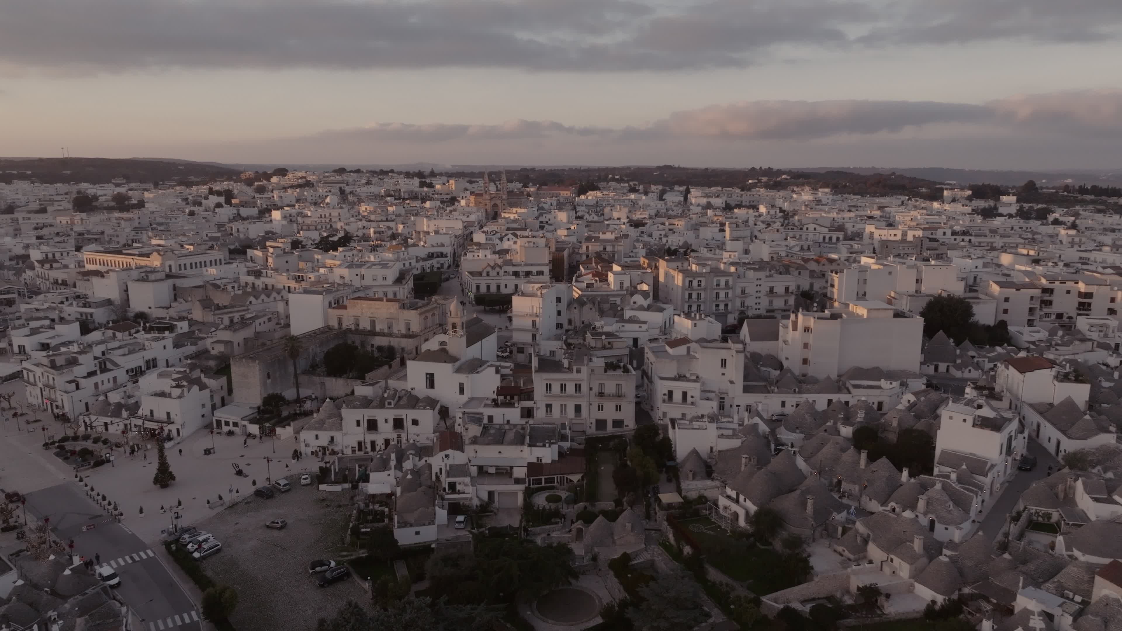 Drone View Of UNESCO World Heritage-listed Trulli Of Alberobello At Sunset