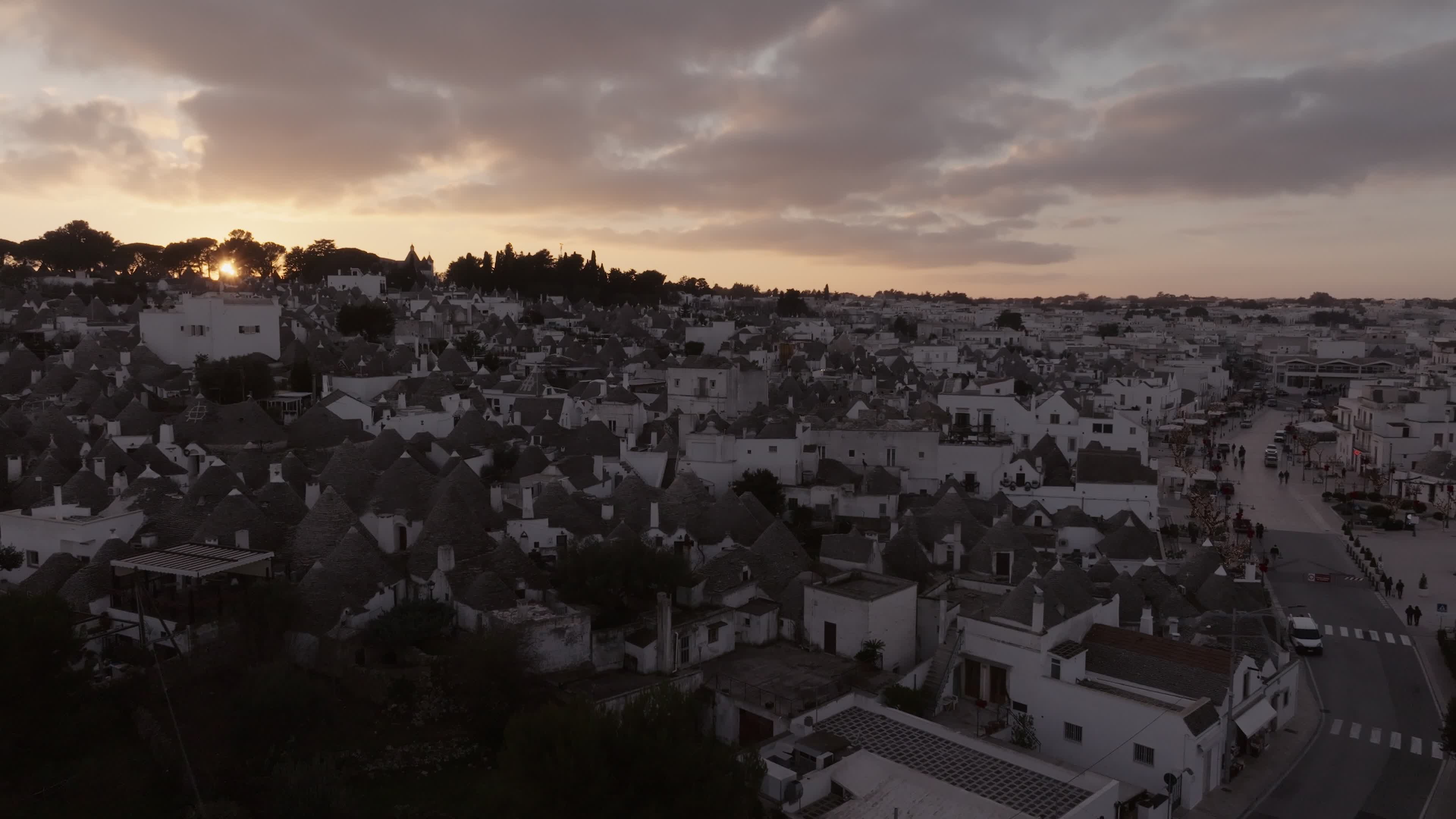 Drone View Of UNESCO World Heritage-listed Trulli Of Alberobello At Sunset