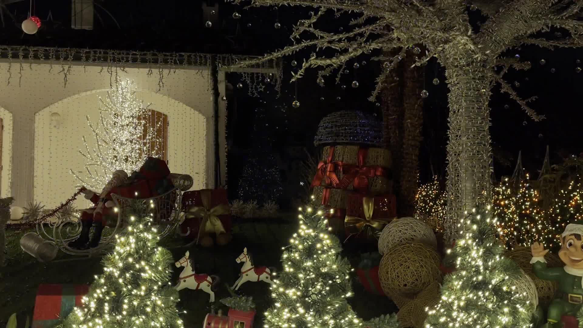 The Casa Di Babbo Natale illuminated every Christmas with over 500000 LED lights in Milan