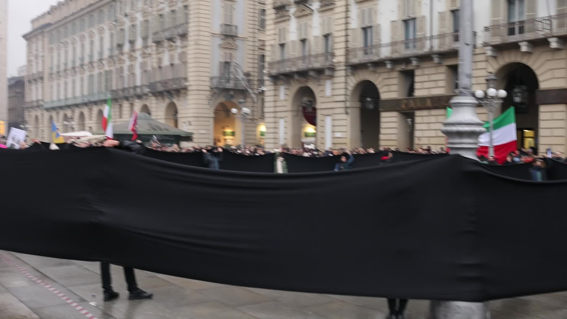 People march In Torino to honor victims of PS752 plane crashed in Teheran