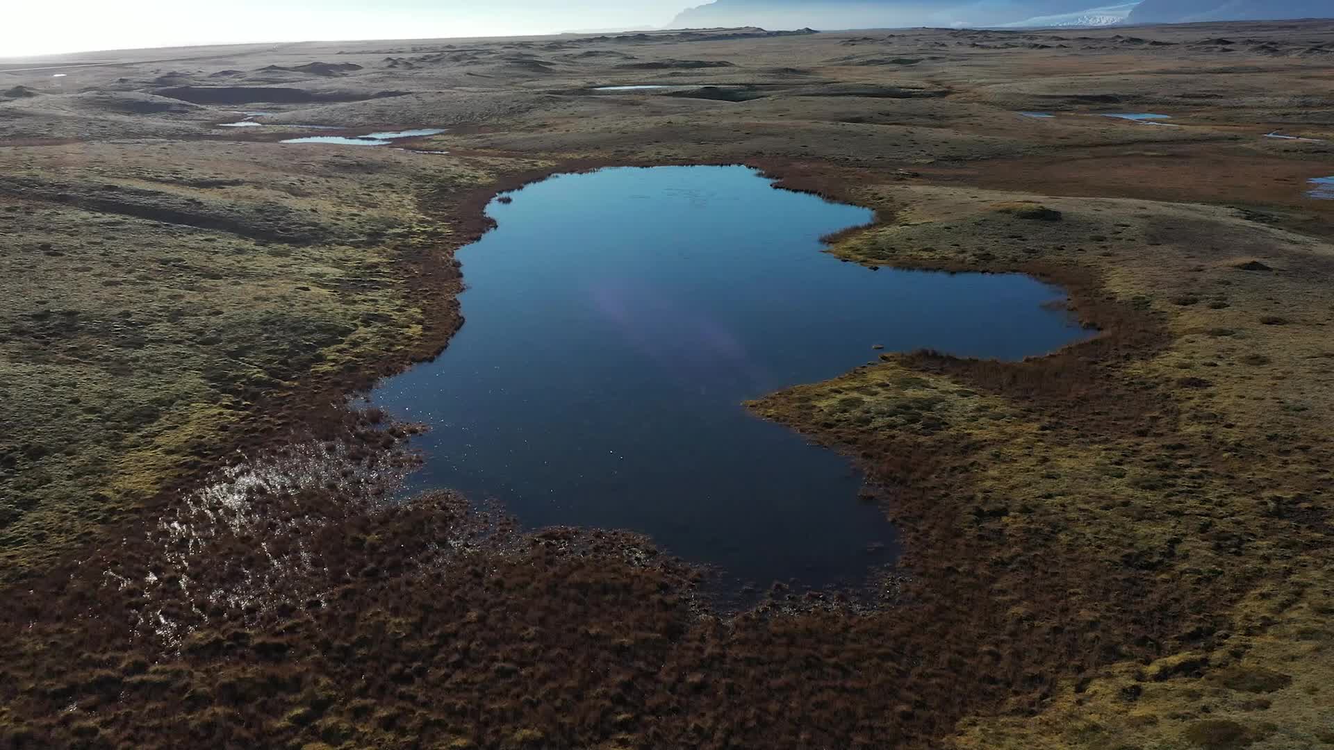 Travel through Iceland's volcanic valleys and ride with local reindeer