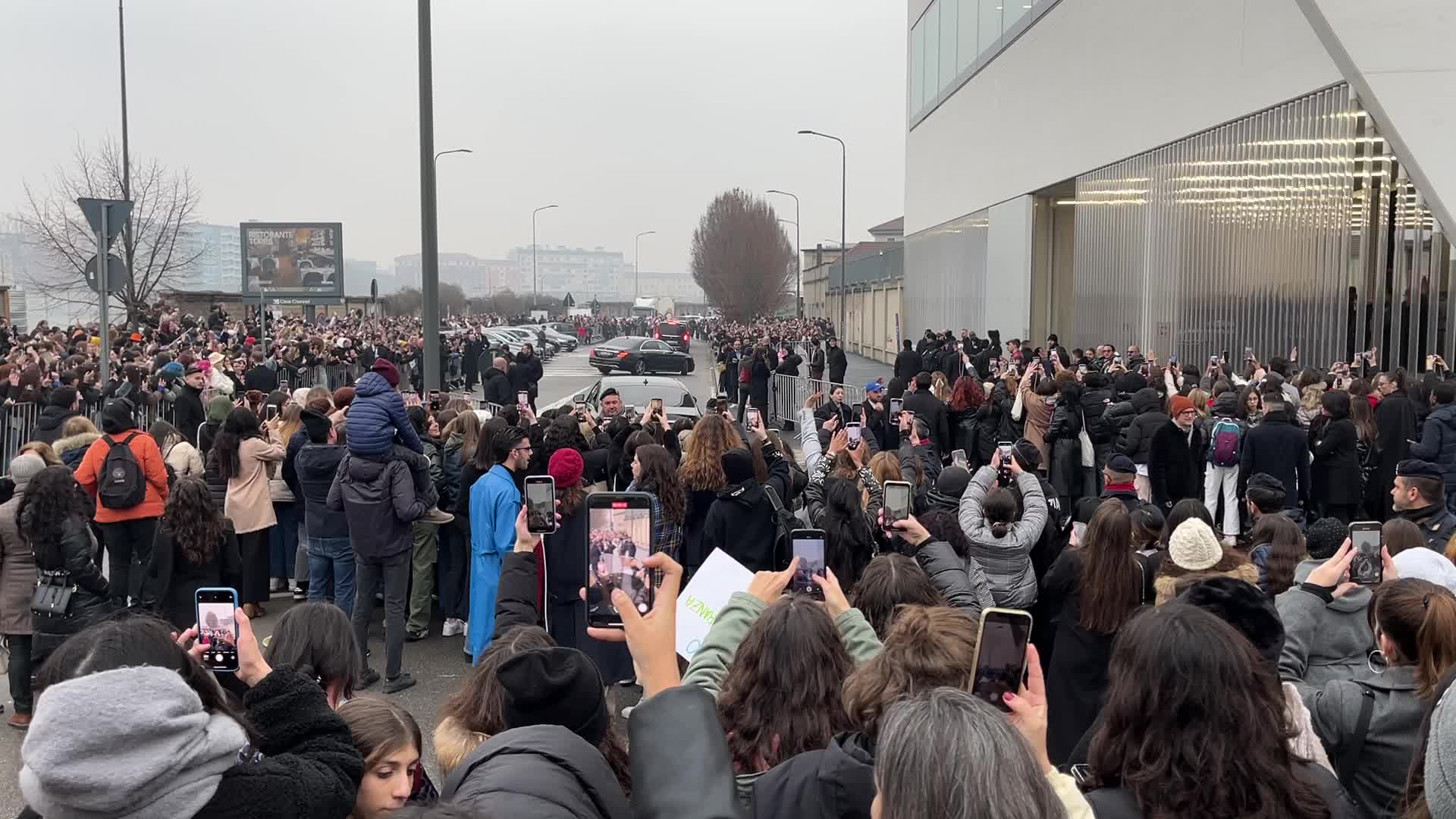 The crowd for the arrival of the South Korean boy band Enhypen at the Prada fashion show during the Milan Men’s Fashion Week Fall/Winter 2023/2024